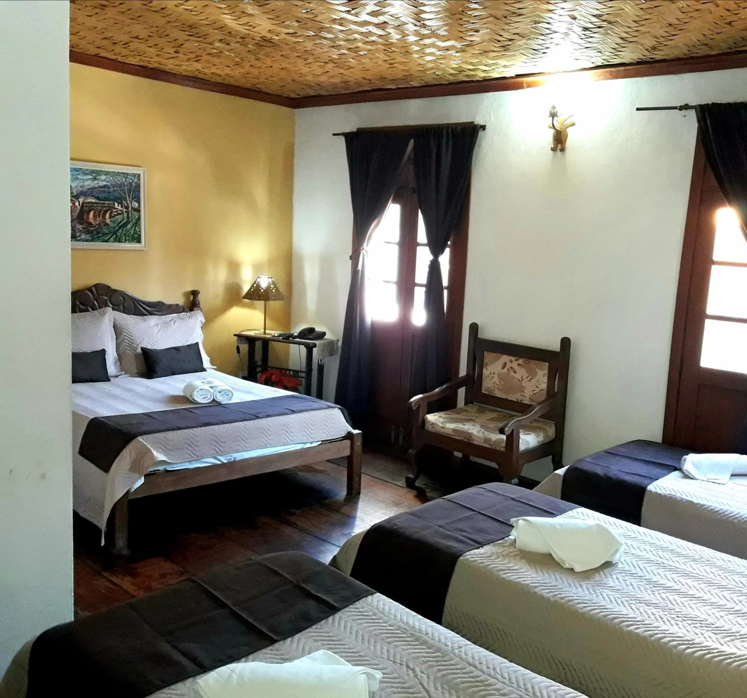 Photo of the whole room, Bed in Pousada Estação do Trem