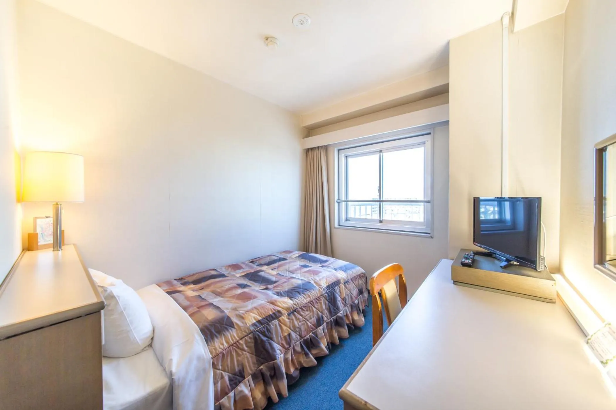 Photo of the whole room in Hotel Sunrise Inn