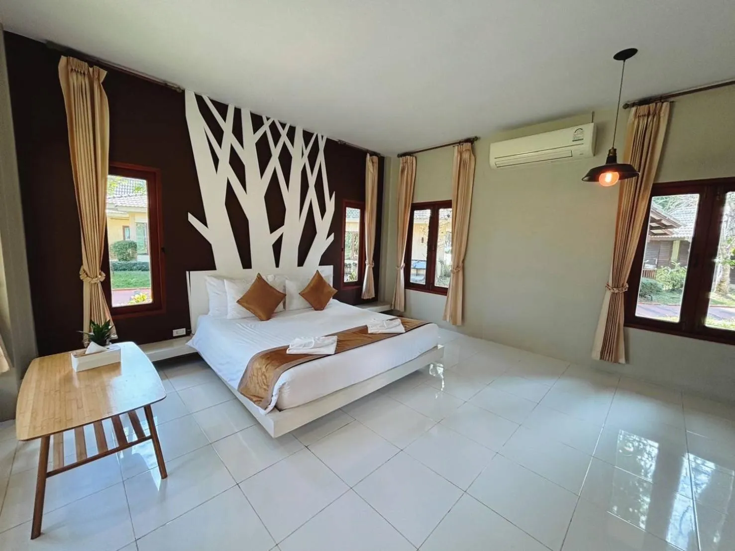 Bed in Panlaan Boutique Resort