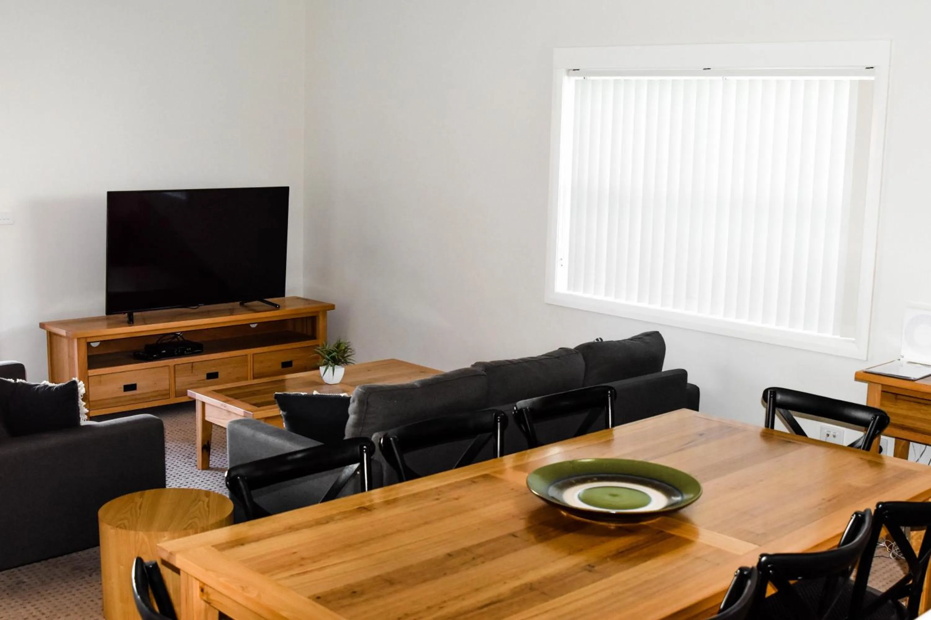Seating area, TV/Entertainment Center in Charles Sturt Suites & Apartments