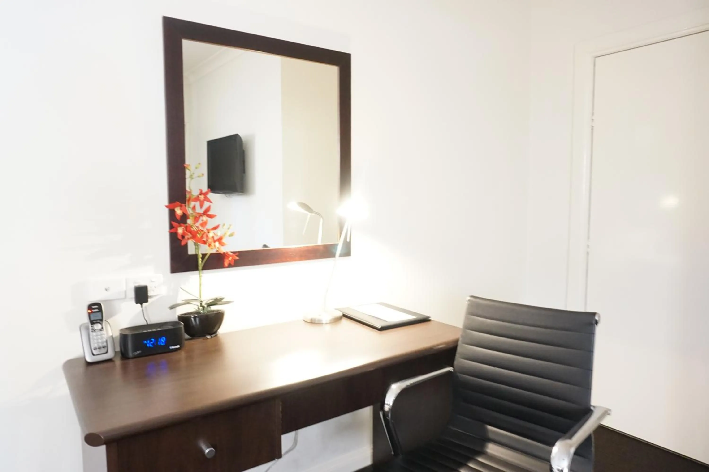 Seating area, TV/Entertainment Center in Charles Sturt Suites & Apartments