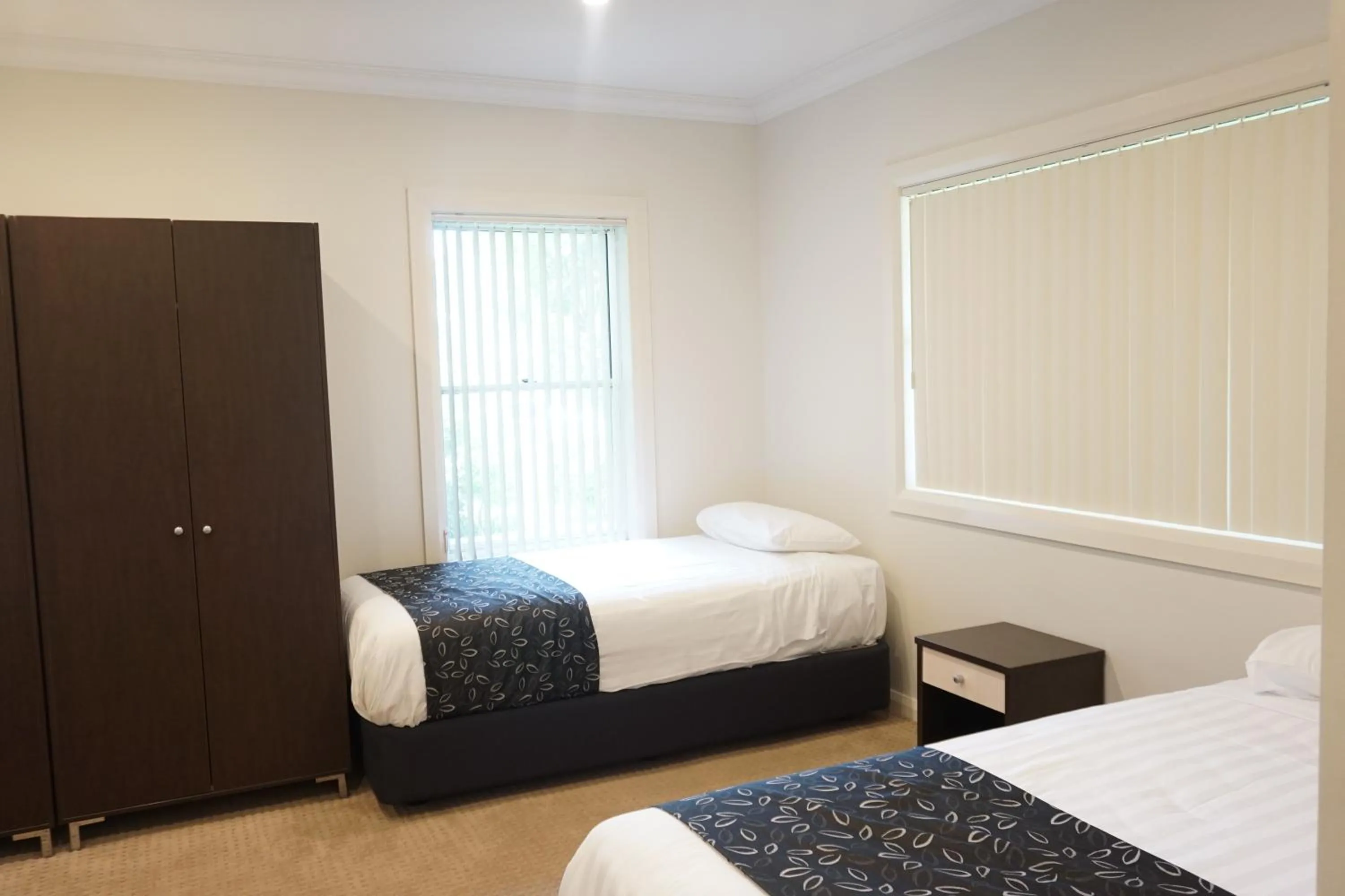 Bed in Charles Sturt Suites & Apartments