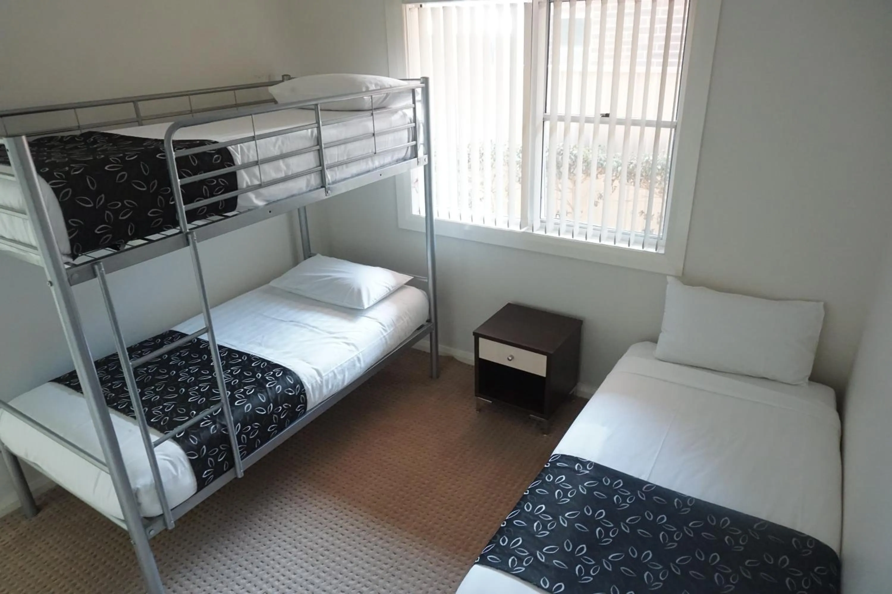 Bed in Charles Sturt Suites & Apartments