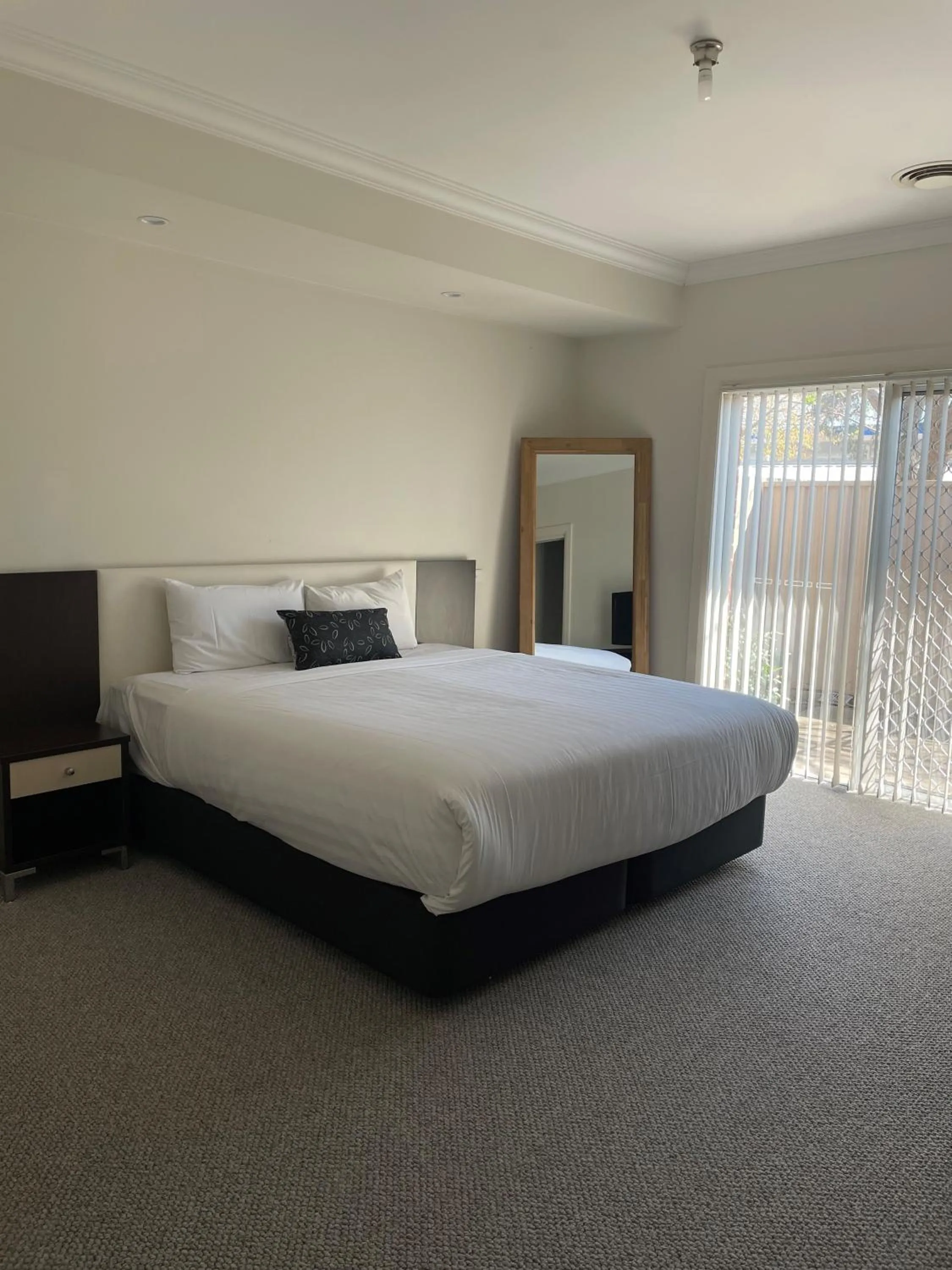 Bedroom, Bed in Charles Sturt Suites & Apartments