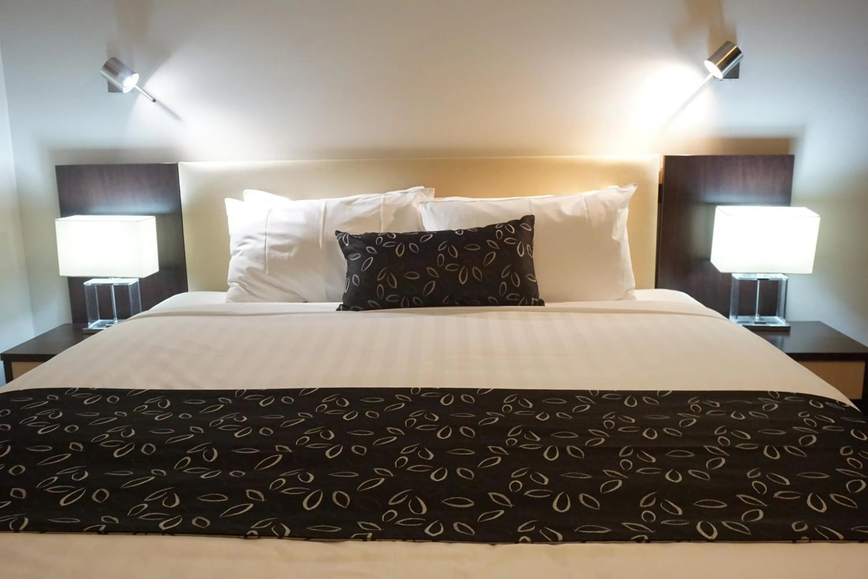 Bed in Charles Sturt Suites & Apartments