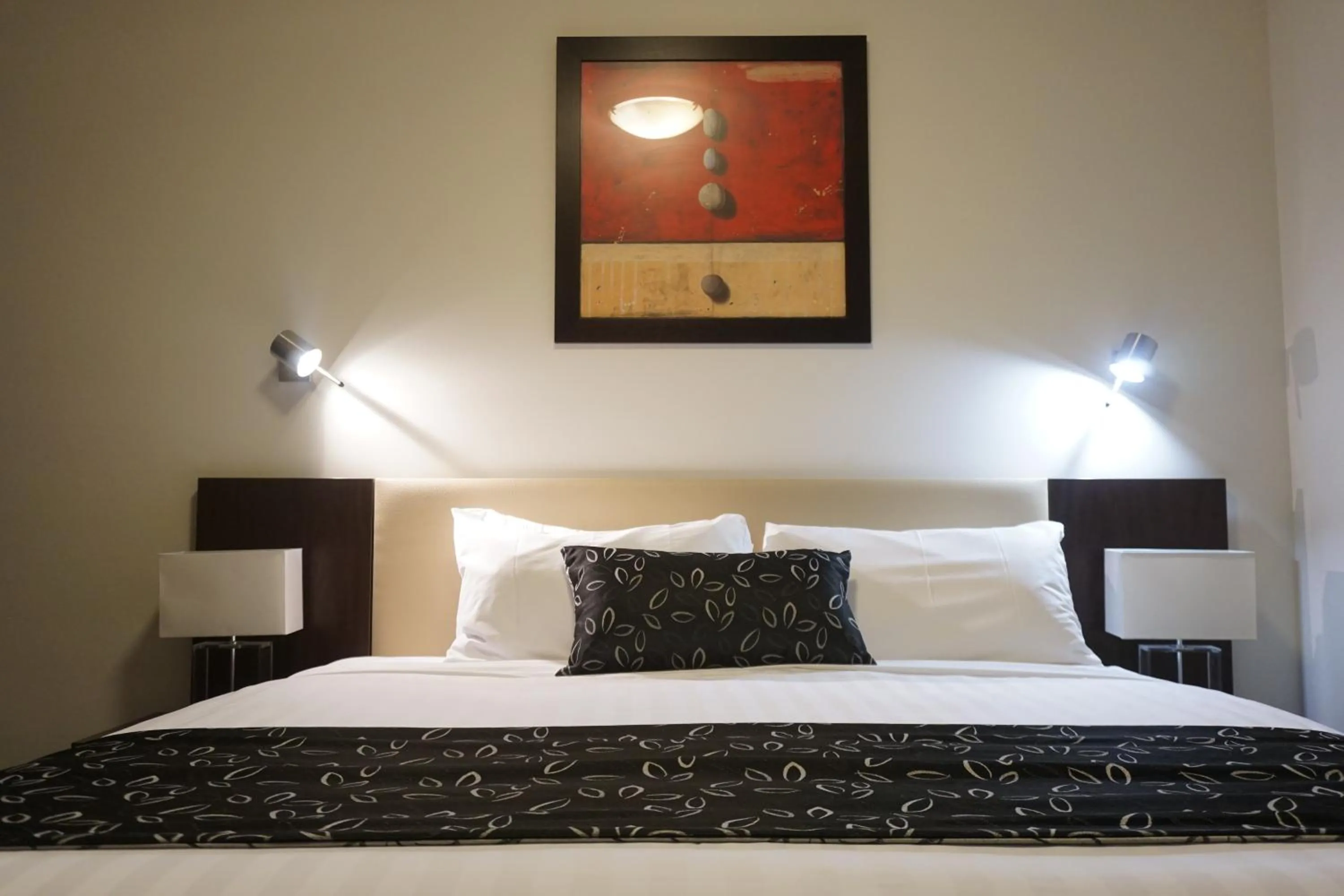 Bed in Charles Sturt Suites & Apartments