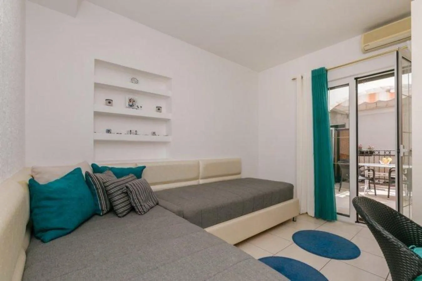 Seating area, Bed in Monte Perla Residence