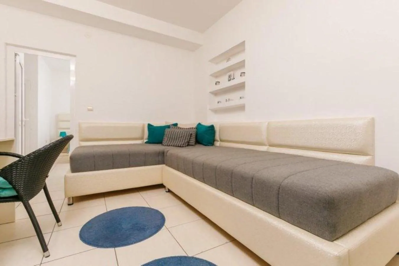 Seating area, Bed in Monte Perla Residence