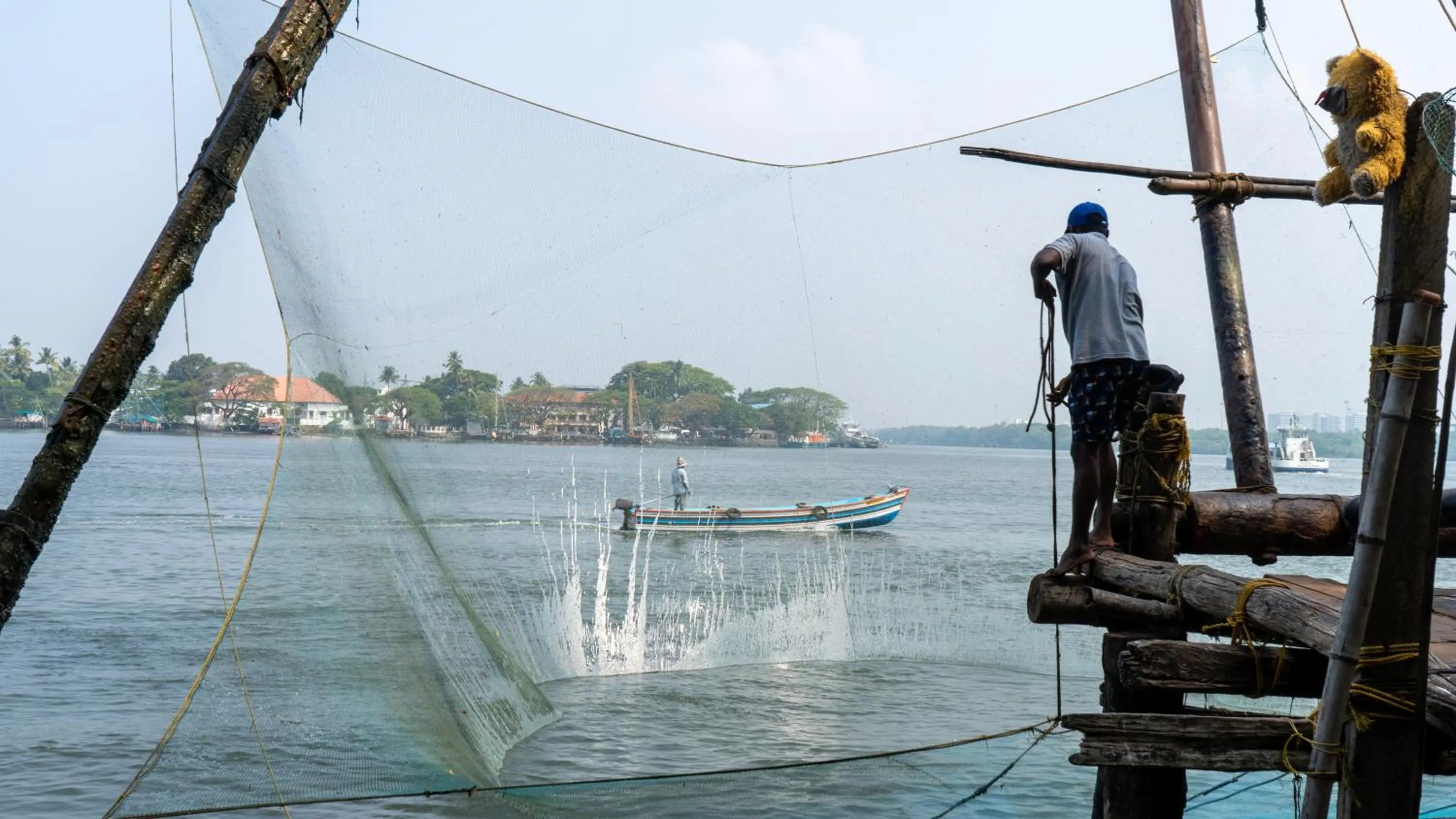 Fishing in Amritara The Poovath Beachfront Heritage, Fort Kochi