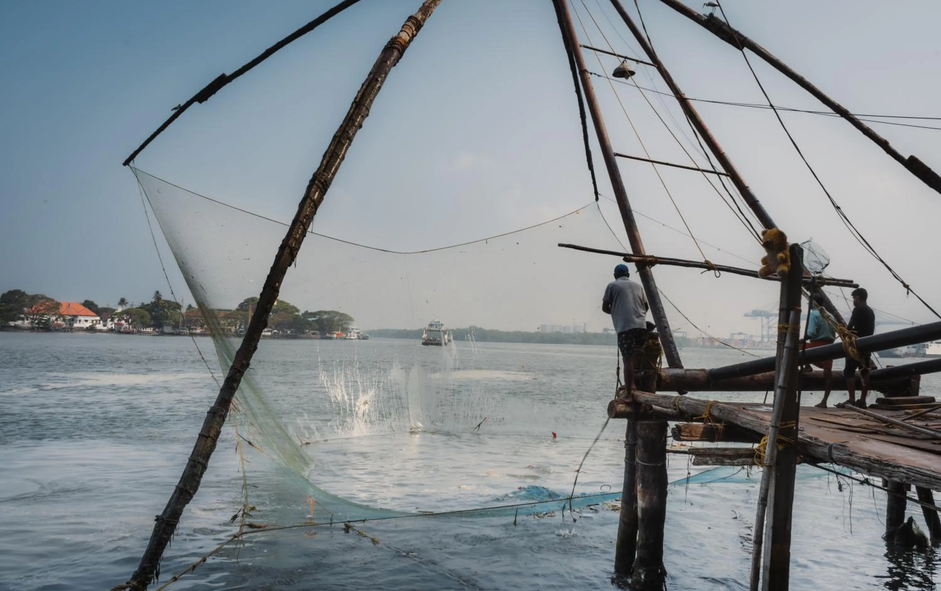 Fishing in Amritara The Poovath Beachfront Heritage, Fort Kochi