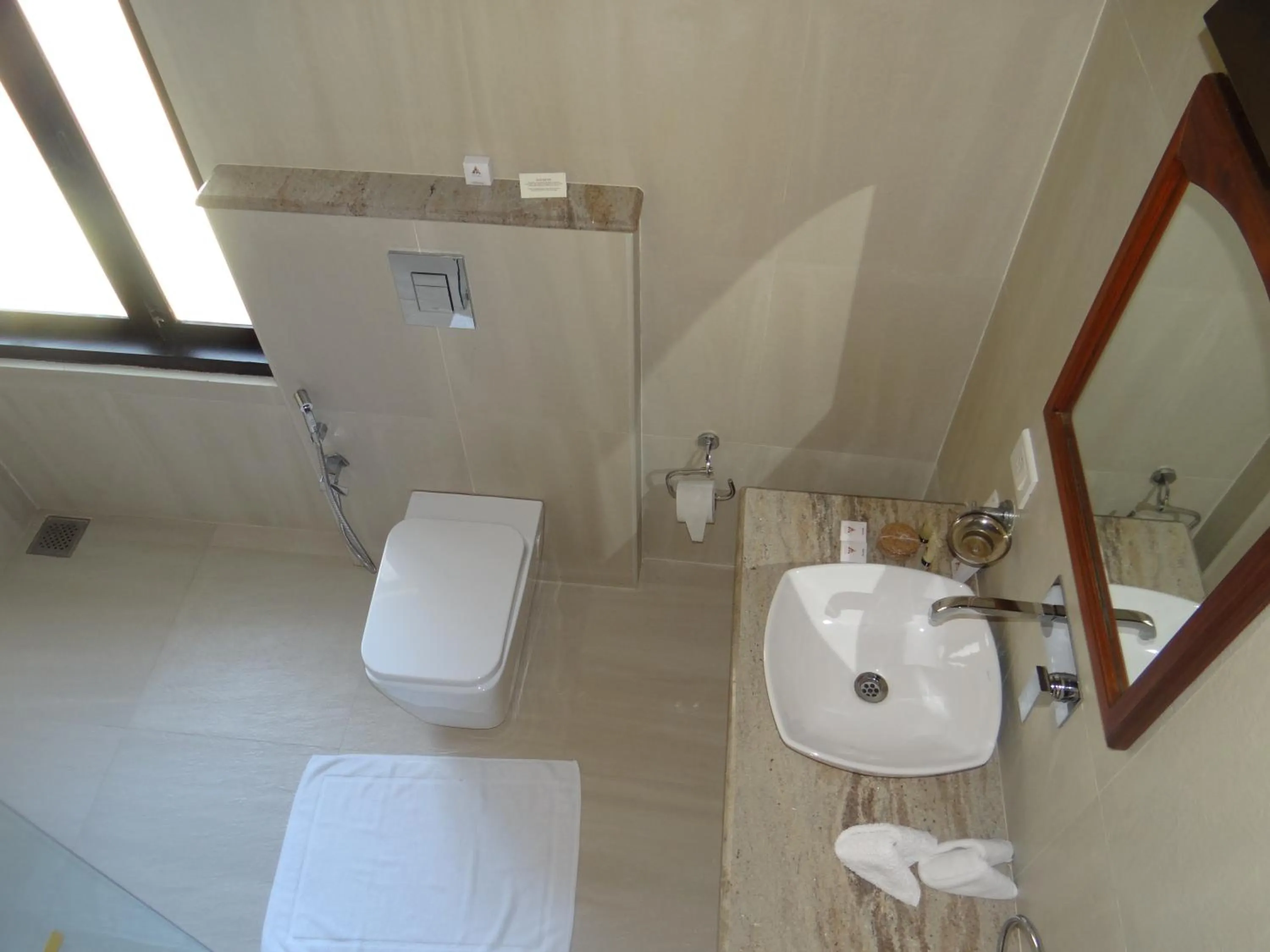 Toilet in Amritara The Poovath Beachfront Heritage, Fort Kochi