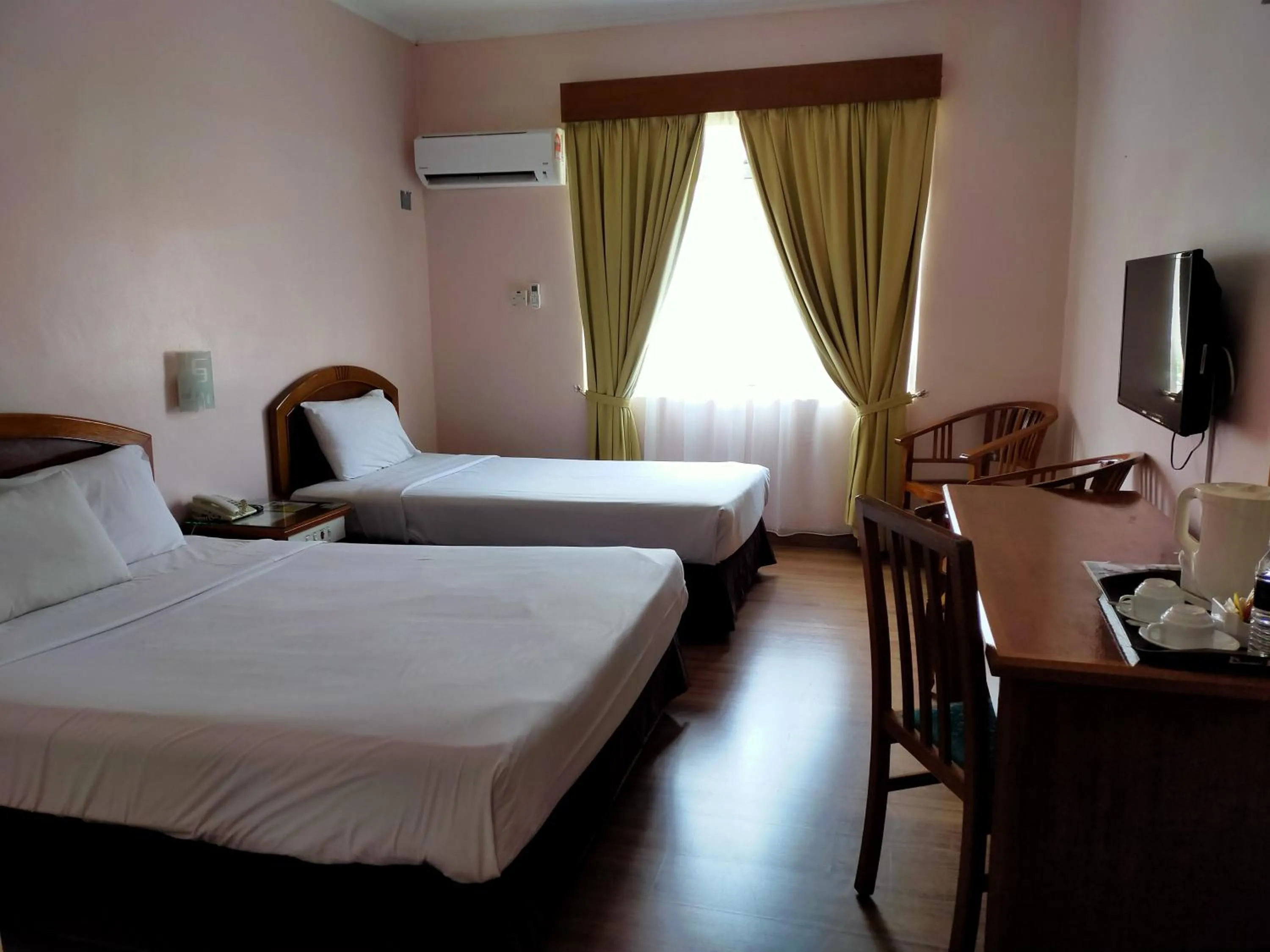 Photo of the whole room, Bed in Hotel Seri Malaysia Bagan Lalang