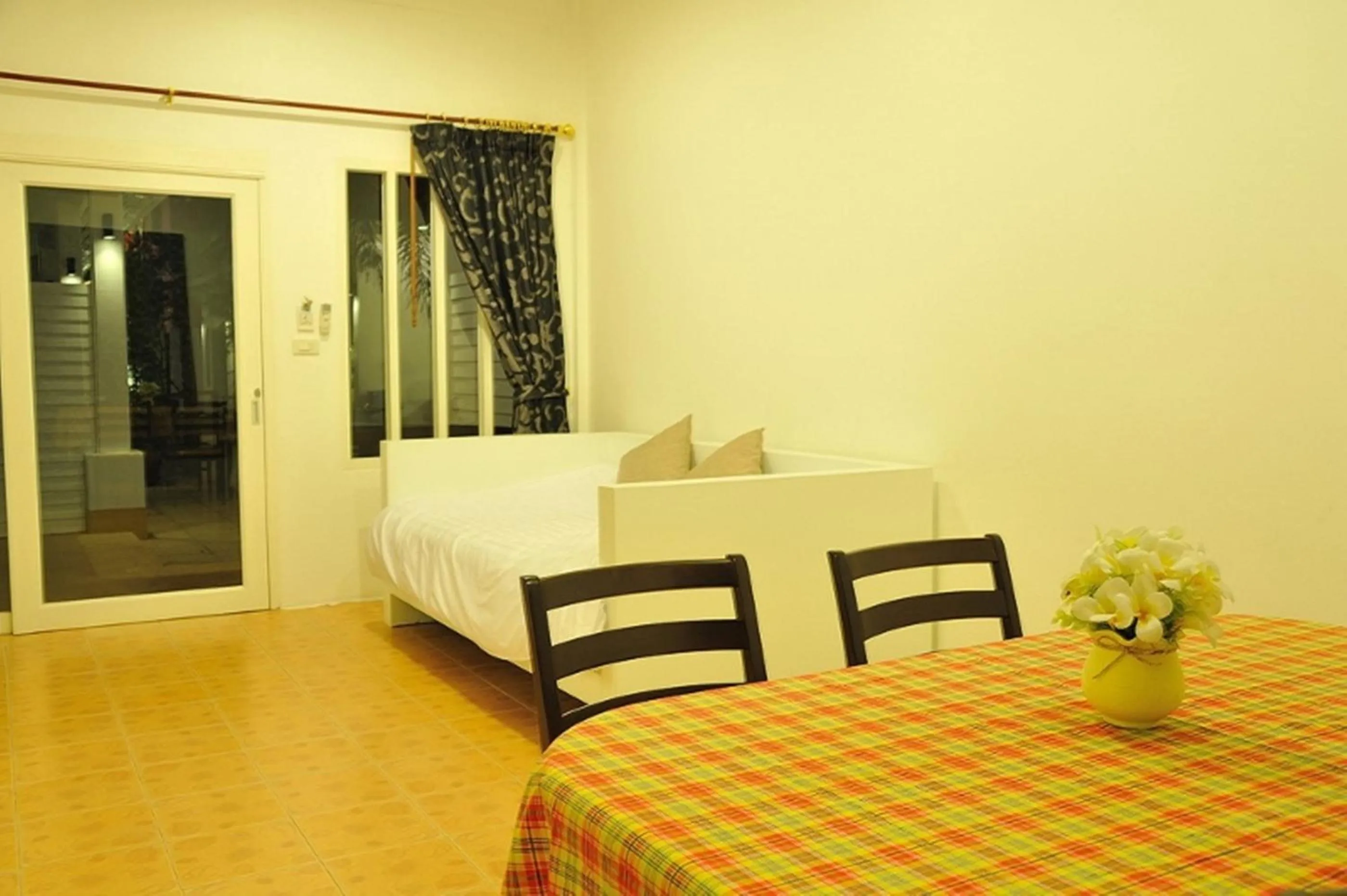 Seating area, Bed in Clear House Phuket