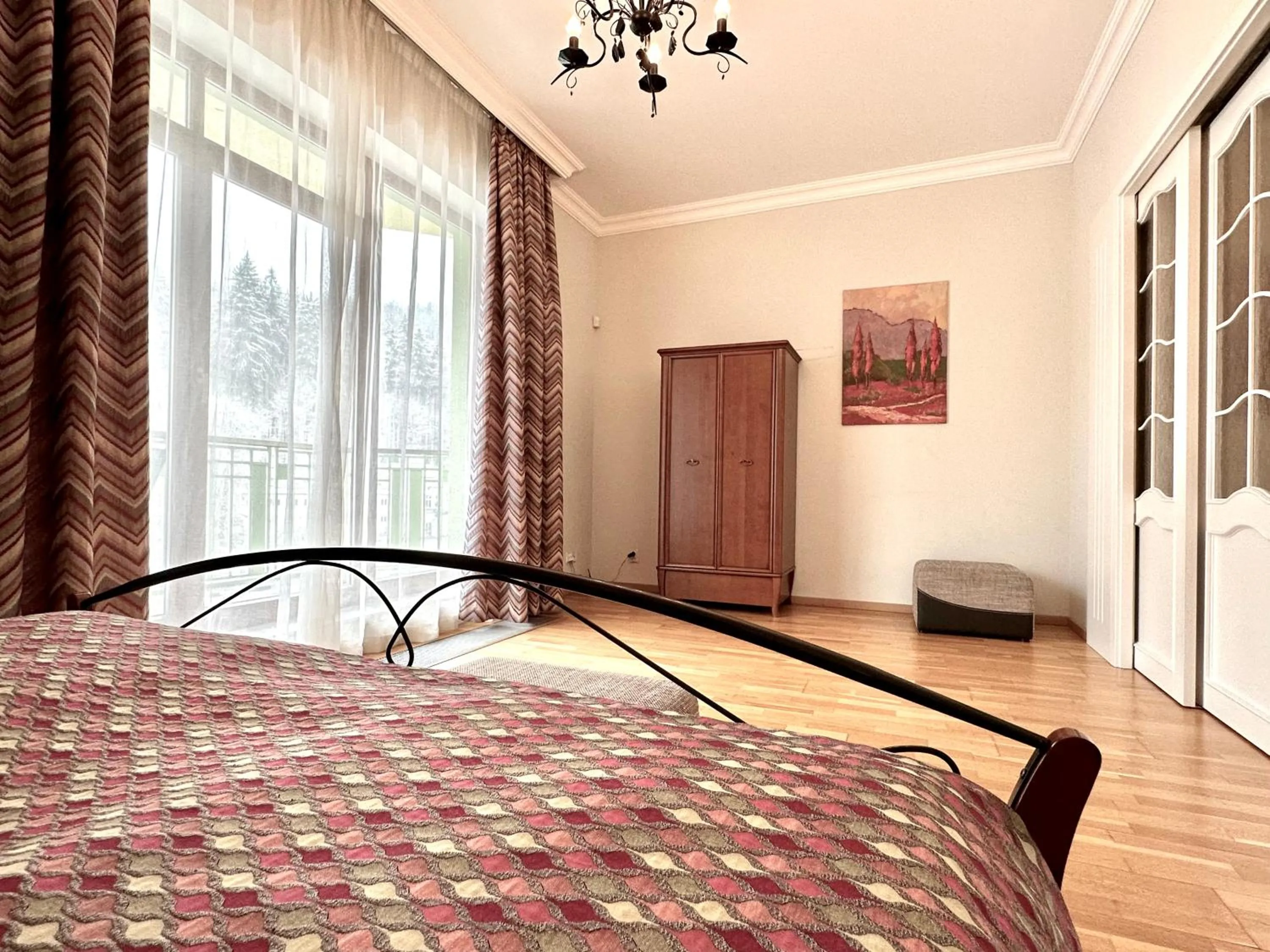 Bed in Slunecni Lazne Apartments