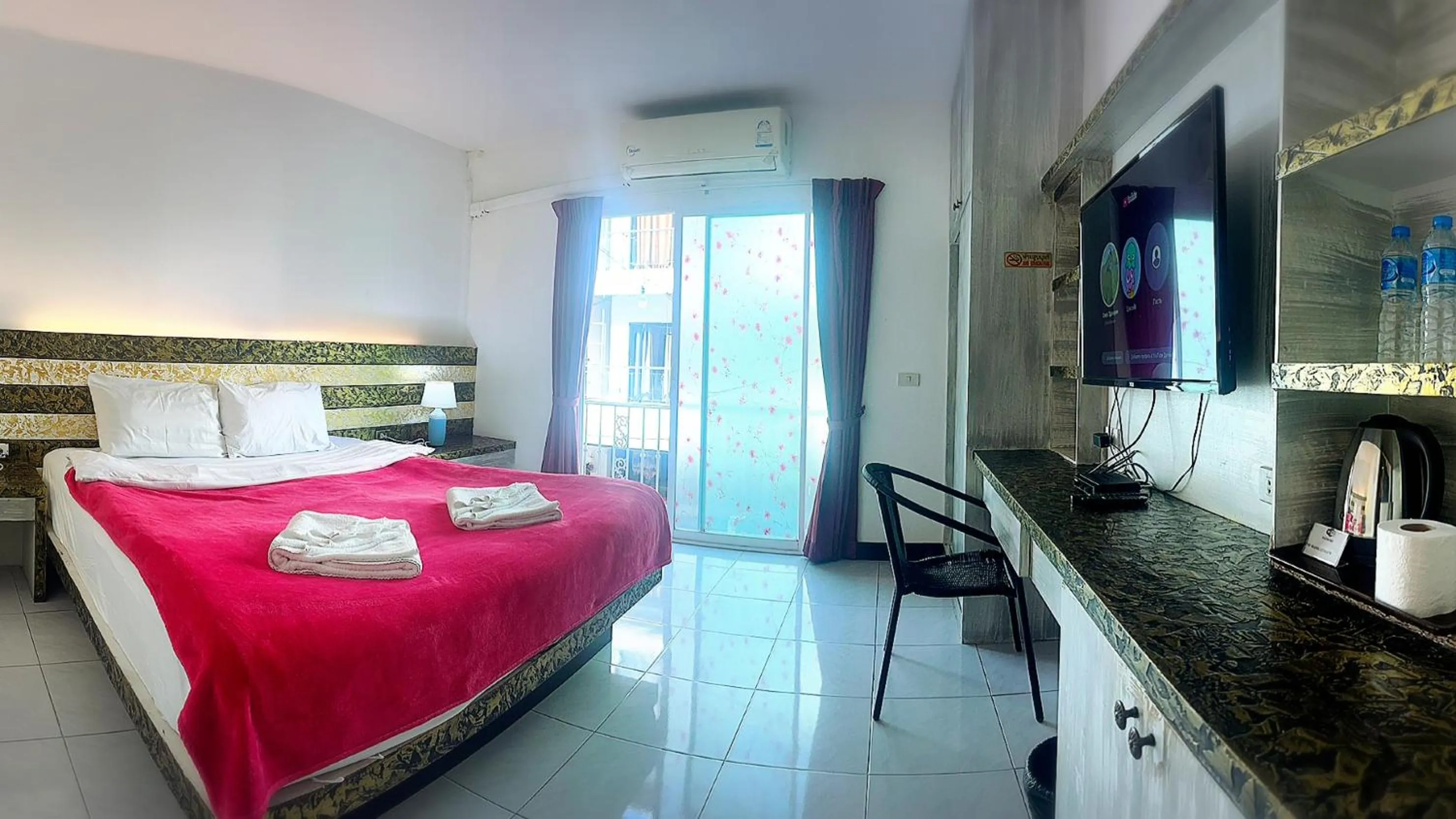 Bed in The Shades Hotel 50 meter Beach Front