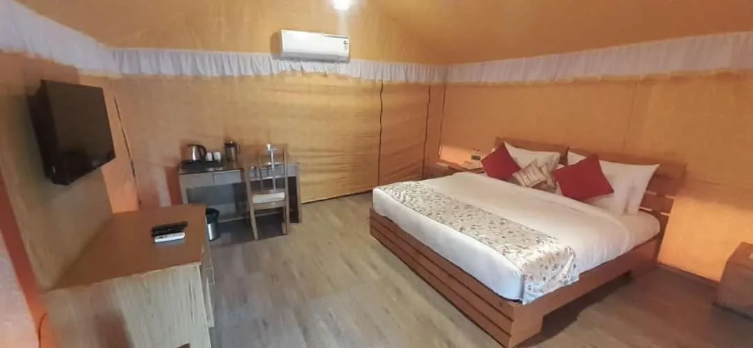 Bed in Four Banyans Spirit & Nature Resort