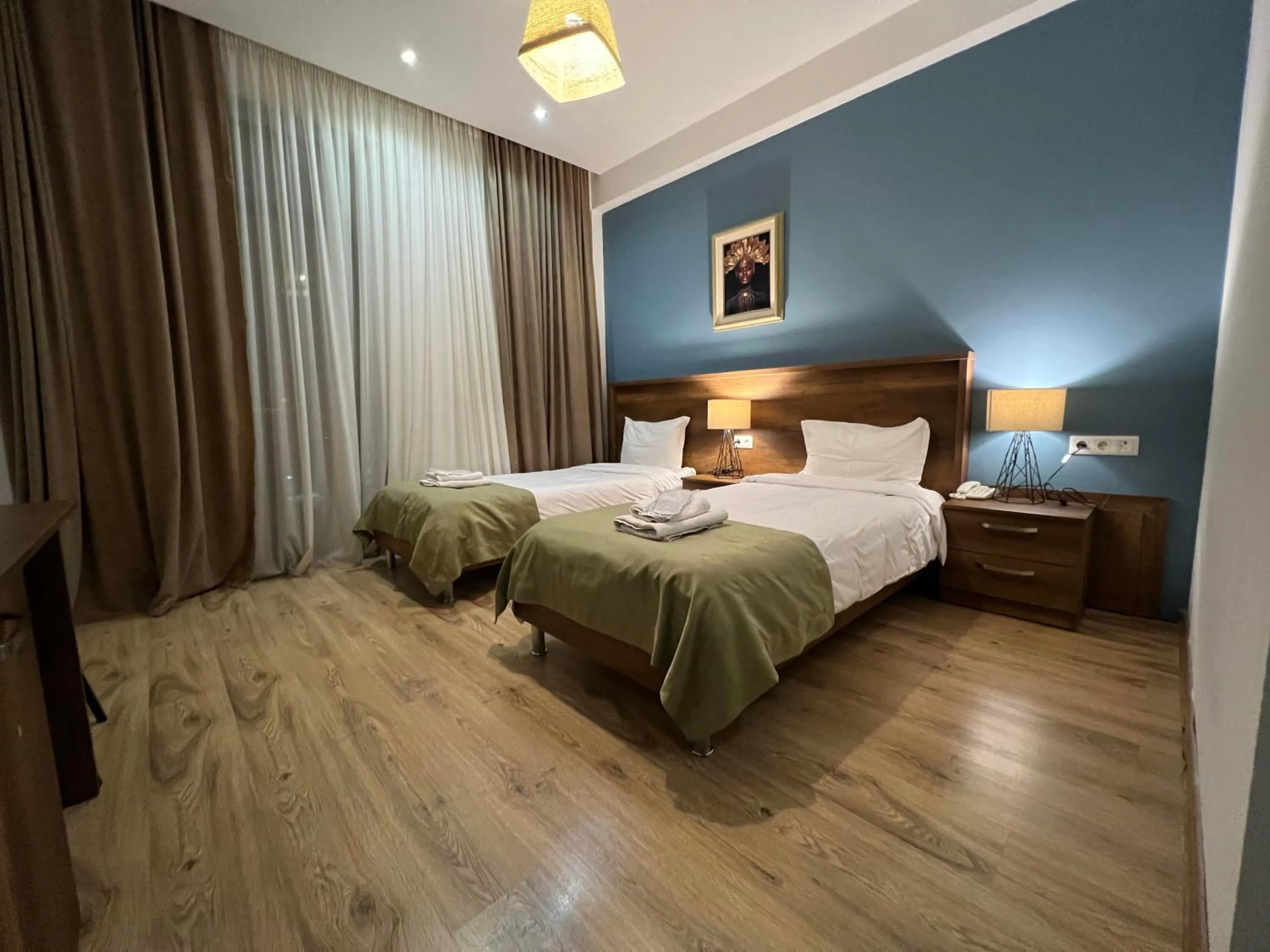 Bed in Hotel King Tom