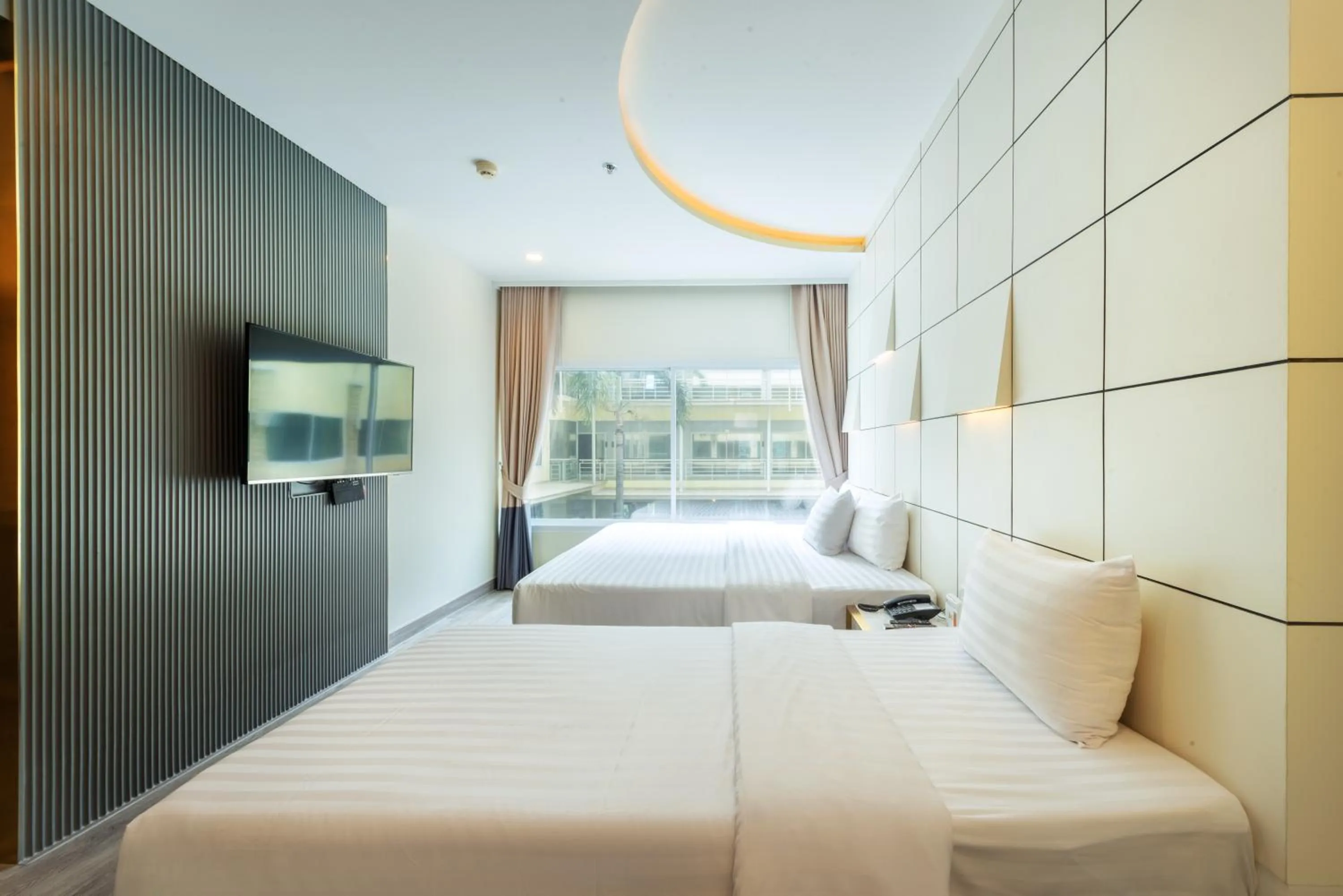 Bed in Qiu Hotel Sukhumvit - BTS On Nut Station
