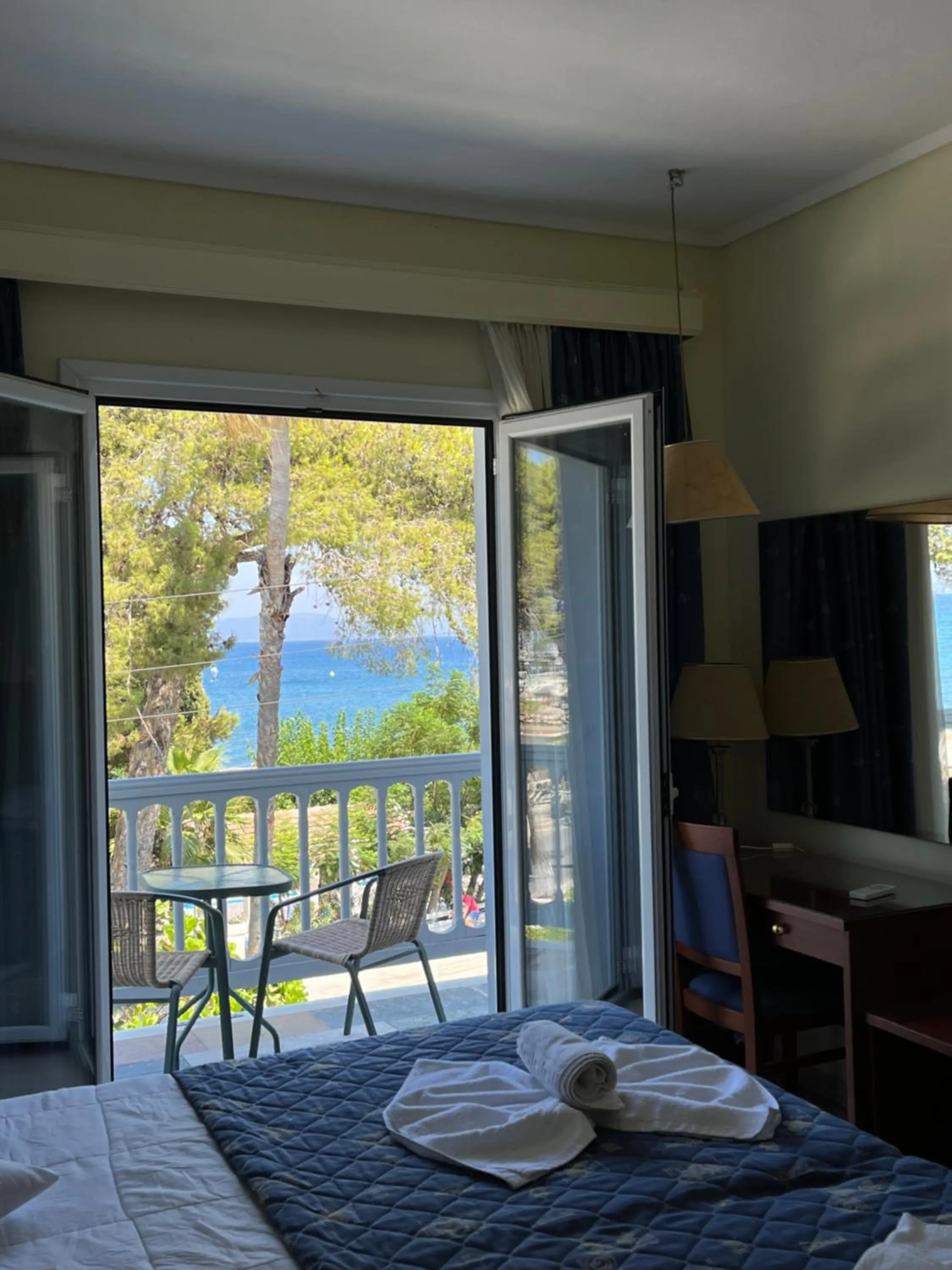 Bed in Theodorou Beach Hotel Apartments