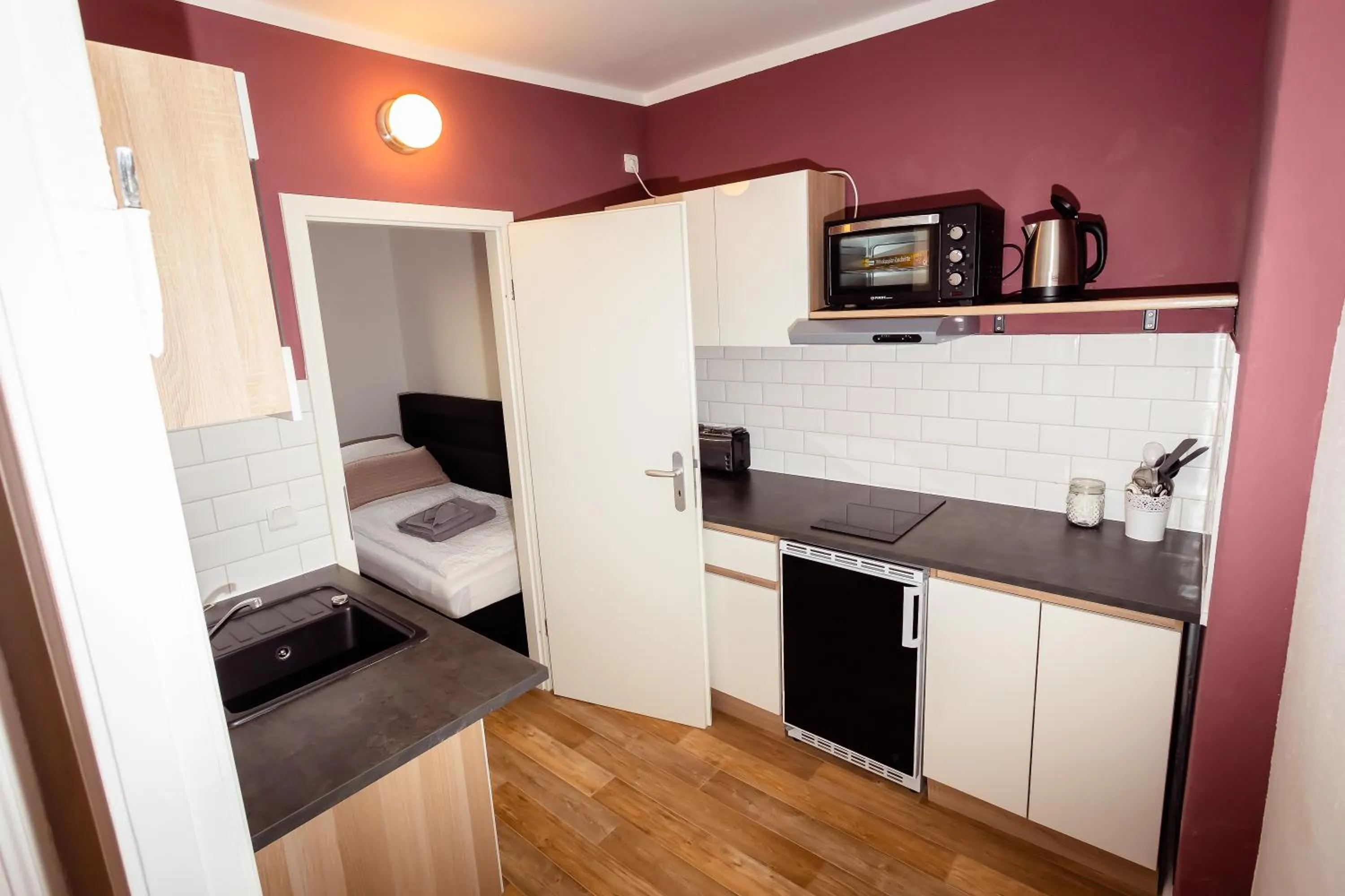 Kitchen or kitchenette in Ferienwohnung Gründerhaus