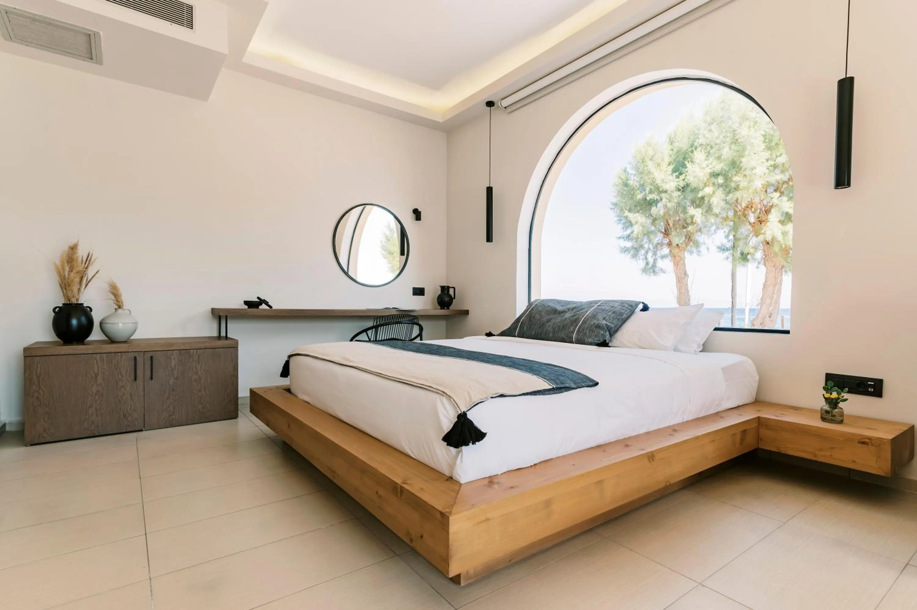 Bed in Villa Di Mare Seaside Suites