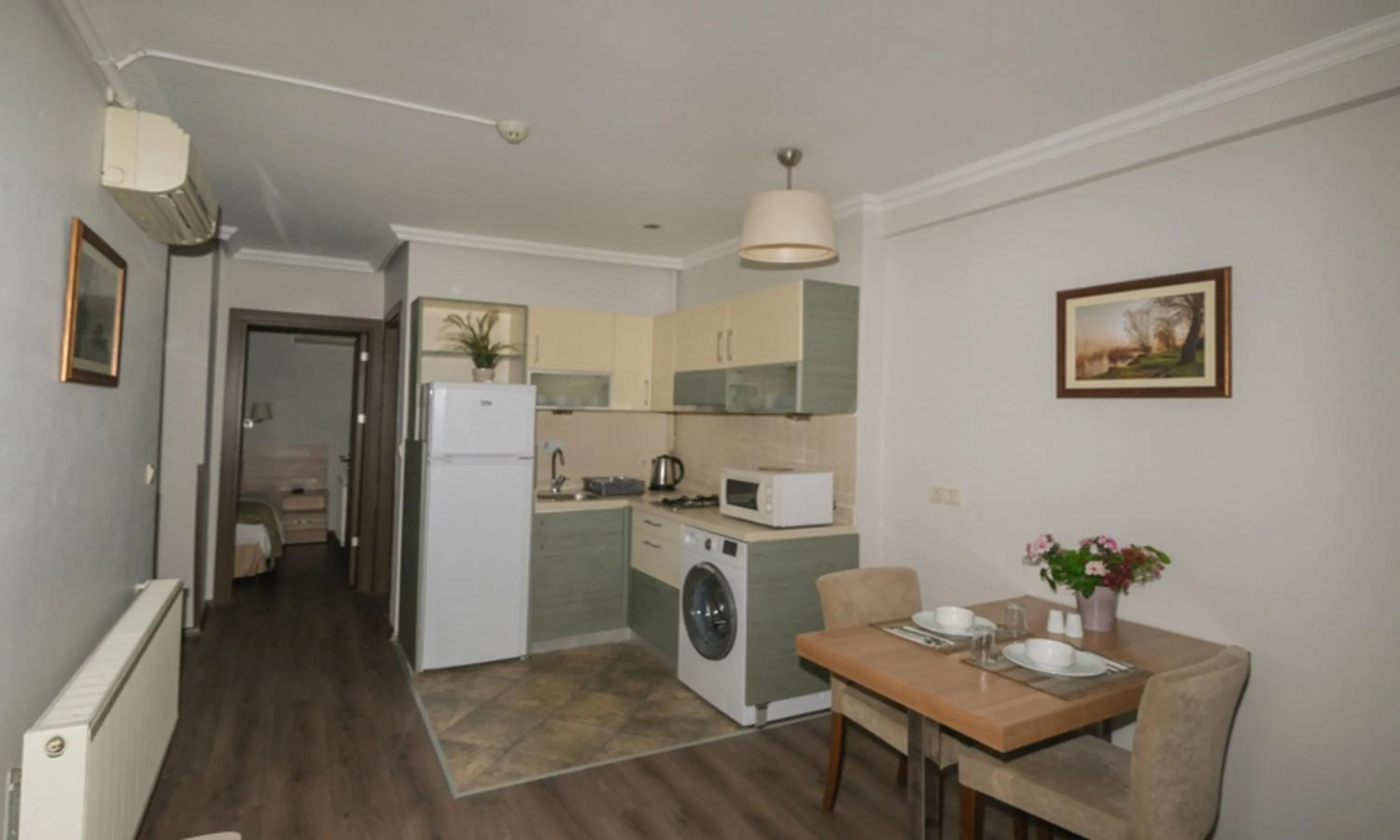 Kitchen or kitchenette in Belle Maison Hotel&Residence