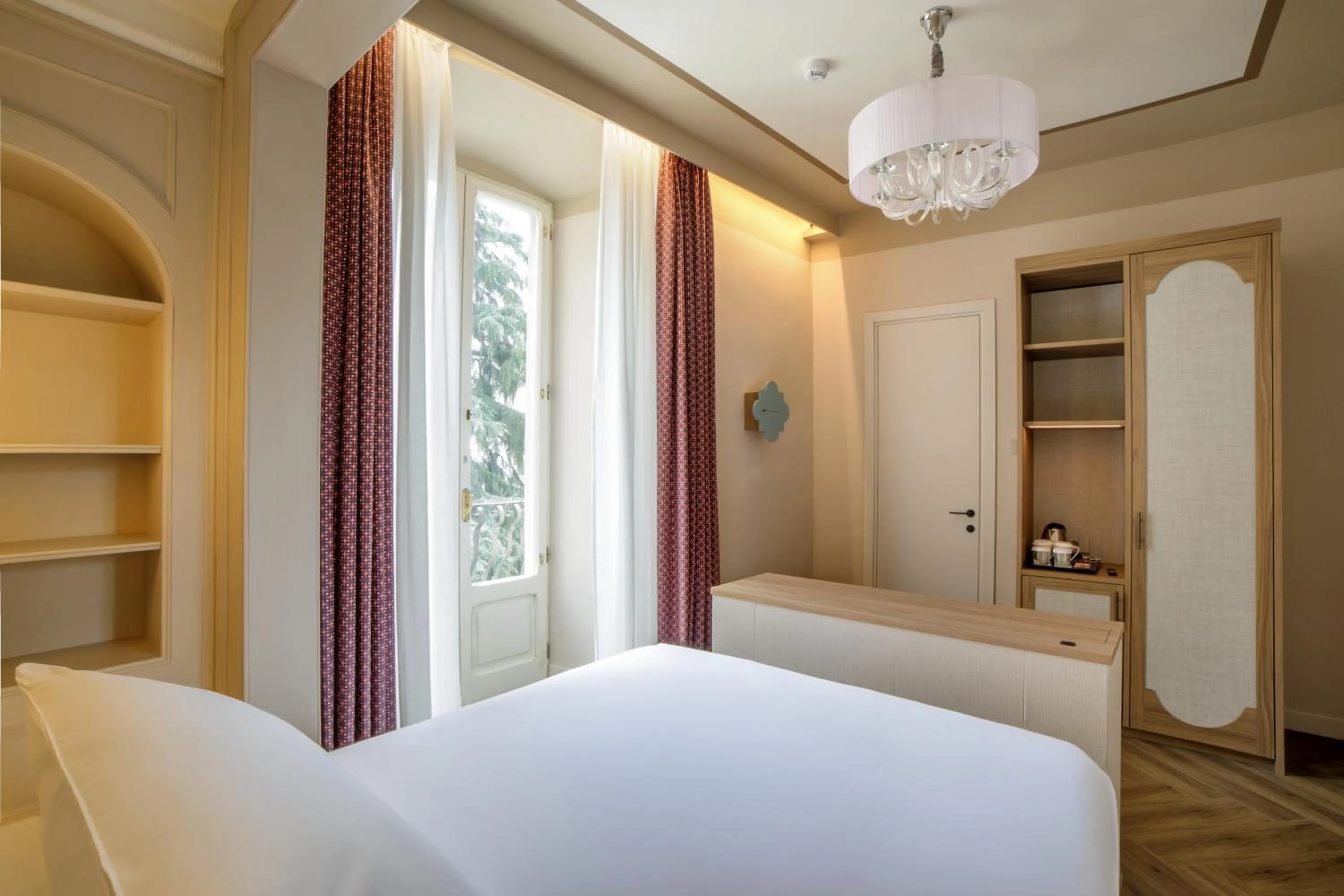 Bed in Rosetta Hotel Perugia Tapestry Collection By Hilton