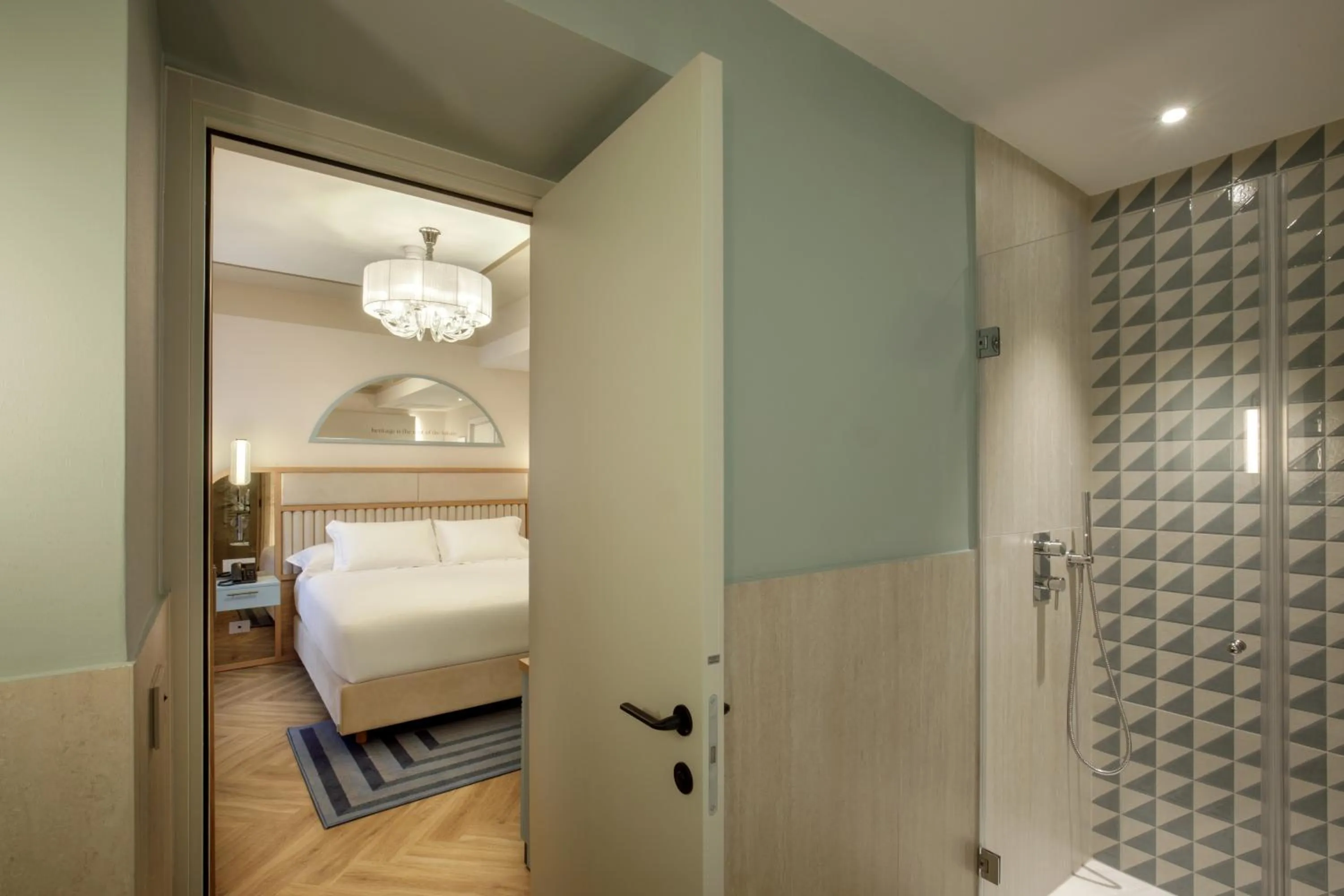 Bed in Rosetta Hotel Perugia Tapestry Collection By Hilton