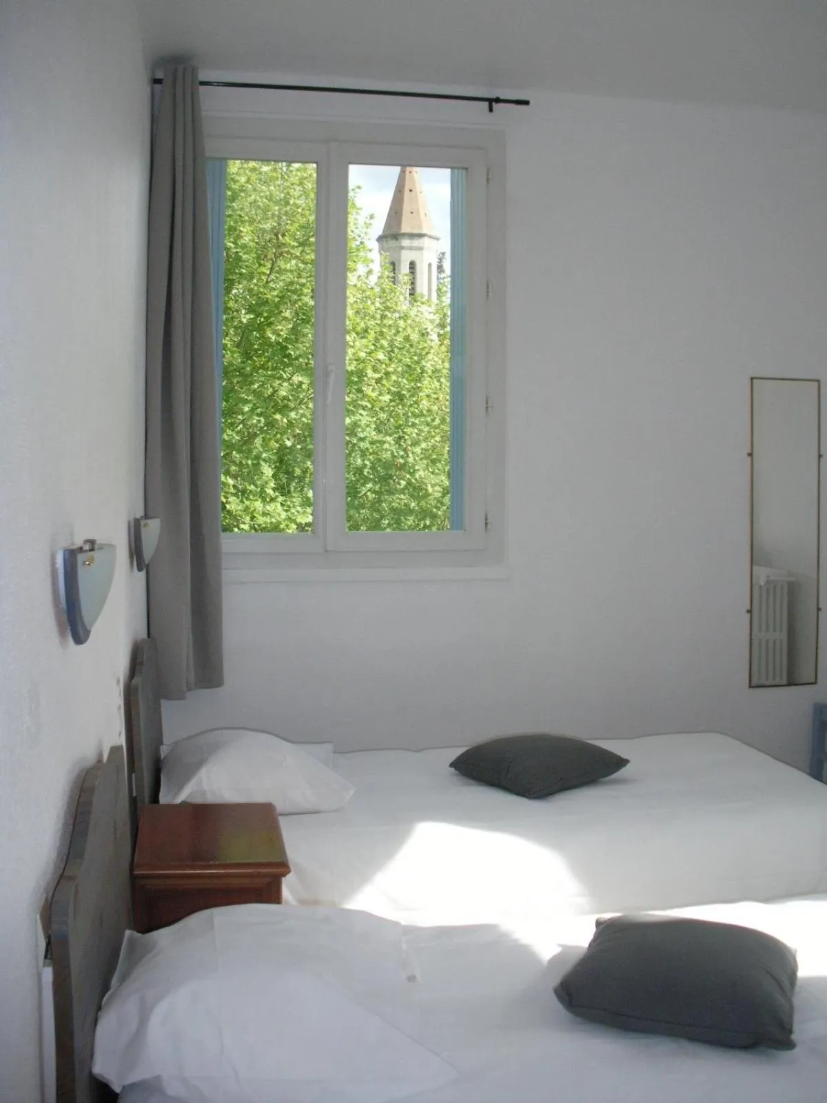 Bed in Hotel De La Poste