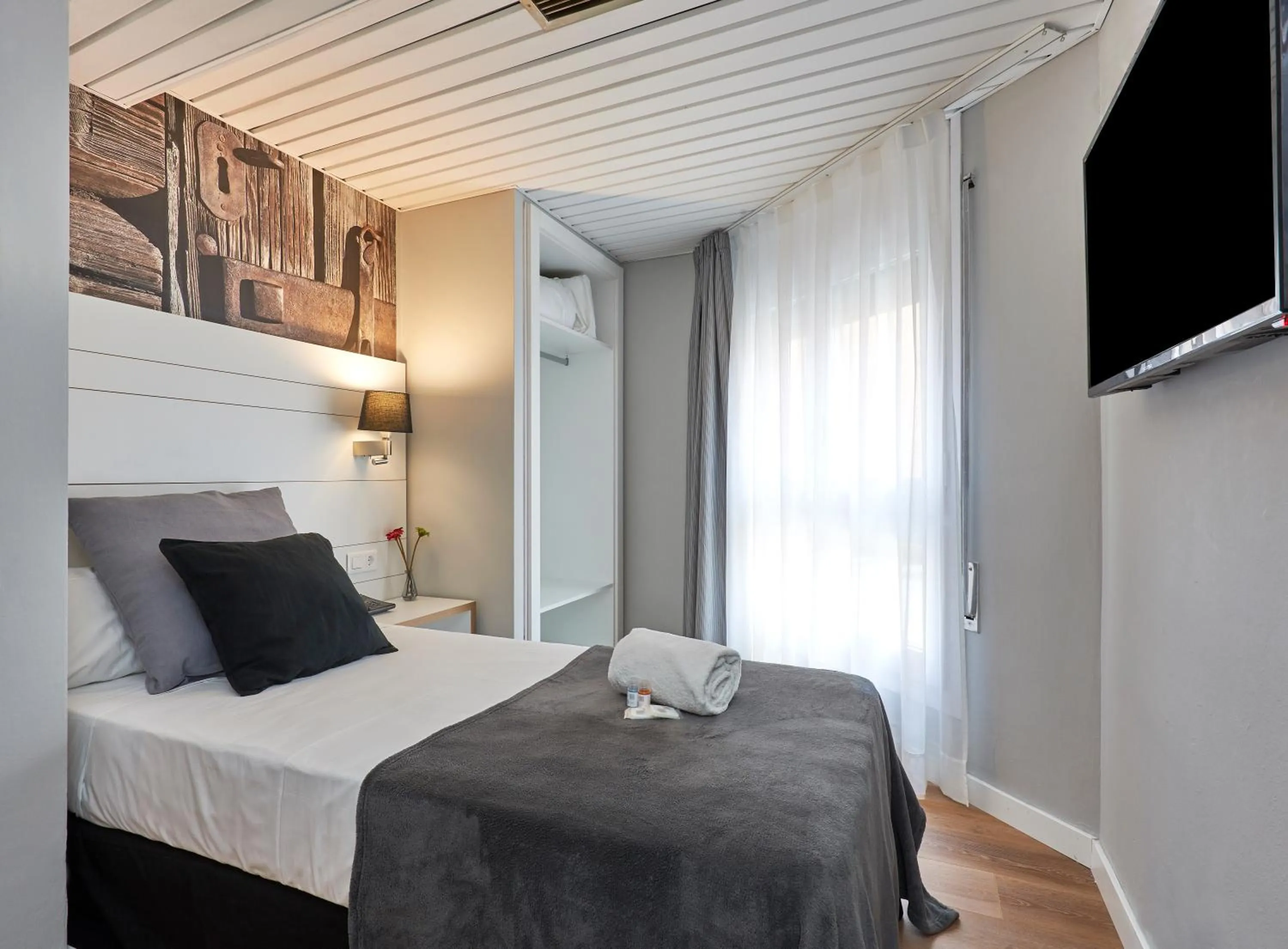 Bed in Hotel Can Pamplona