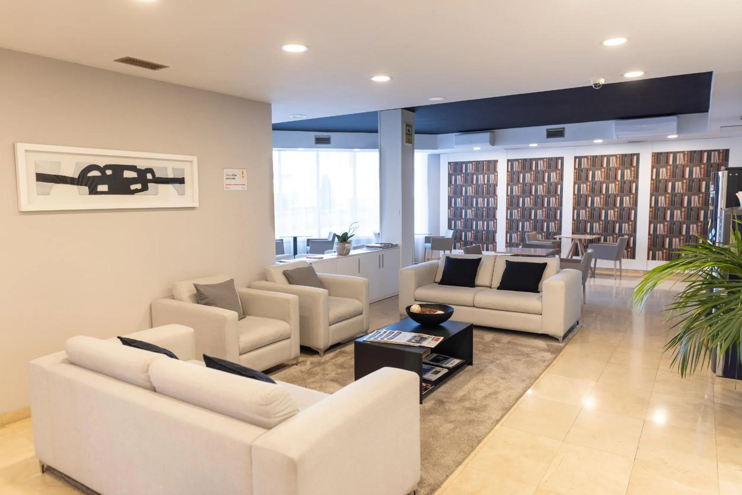 Communal lounge/ TV room in Hotel Can Pamplona