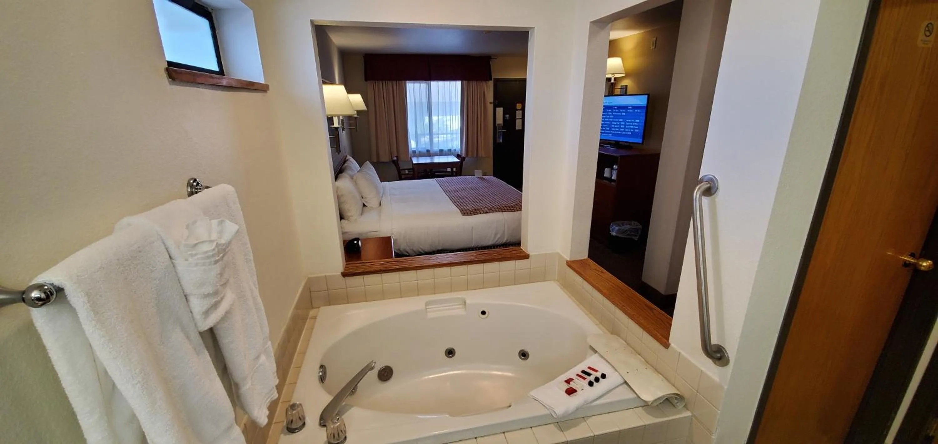 Bathroom, Bed in Baymont by Wyndham Seattle/Kirkland WA