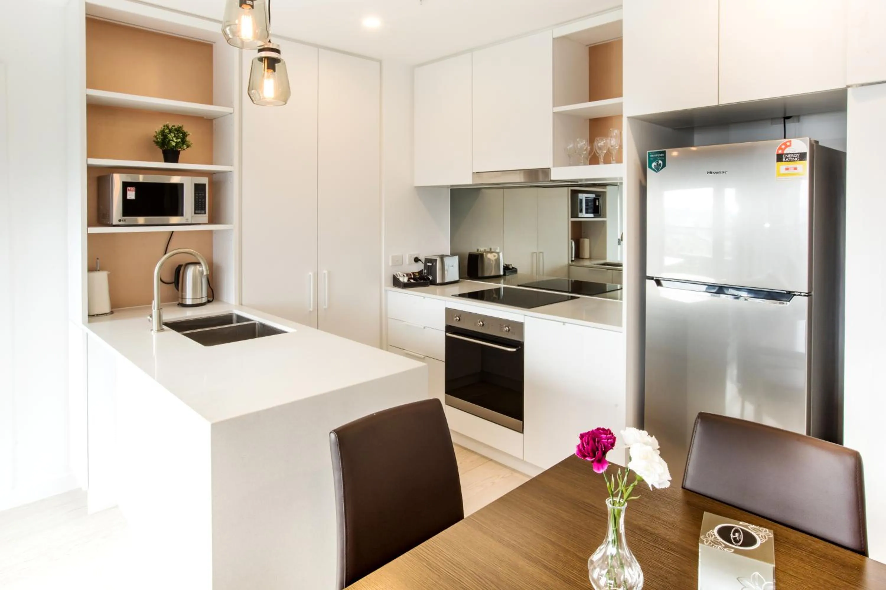 Kitchen or kitchenette in Spencer Street Apartments