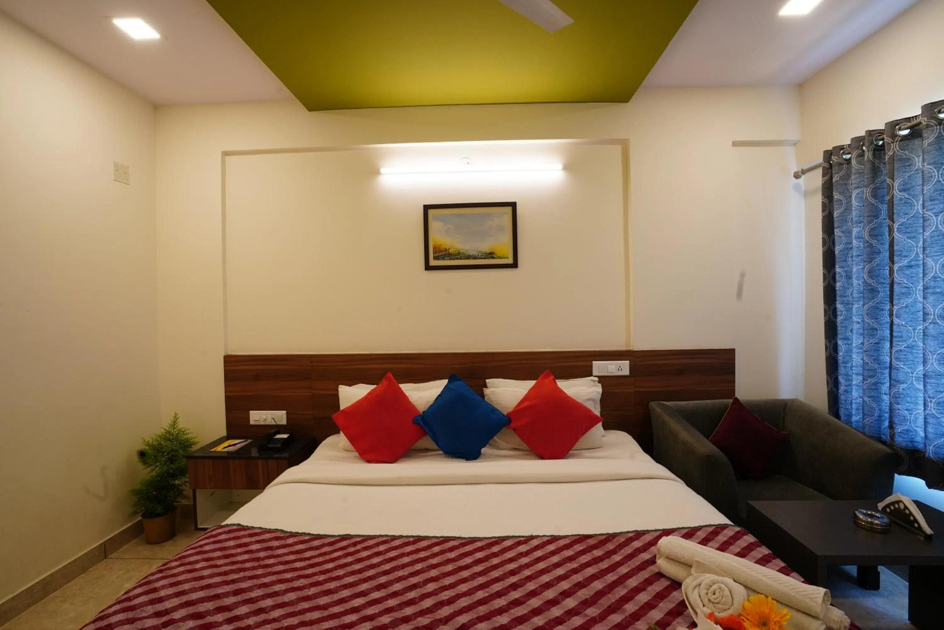 Bed in Silicon Inn Hotel Bangalore Airport