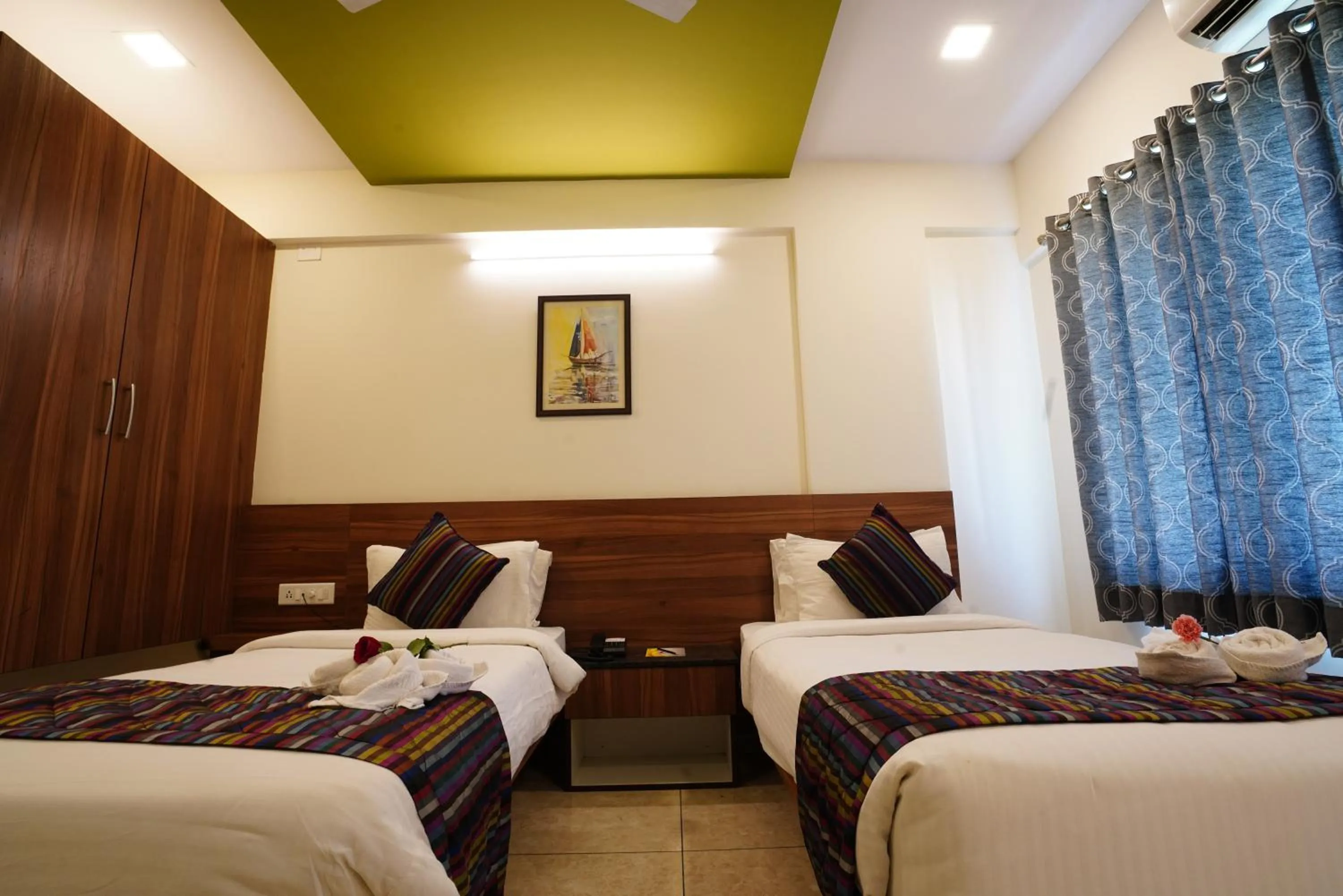 Bed in Silicon Inn Hotel Bangalore Airport