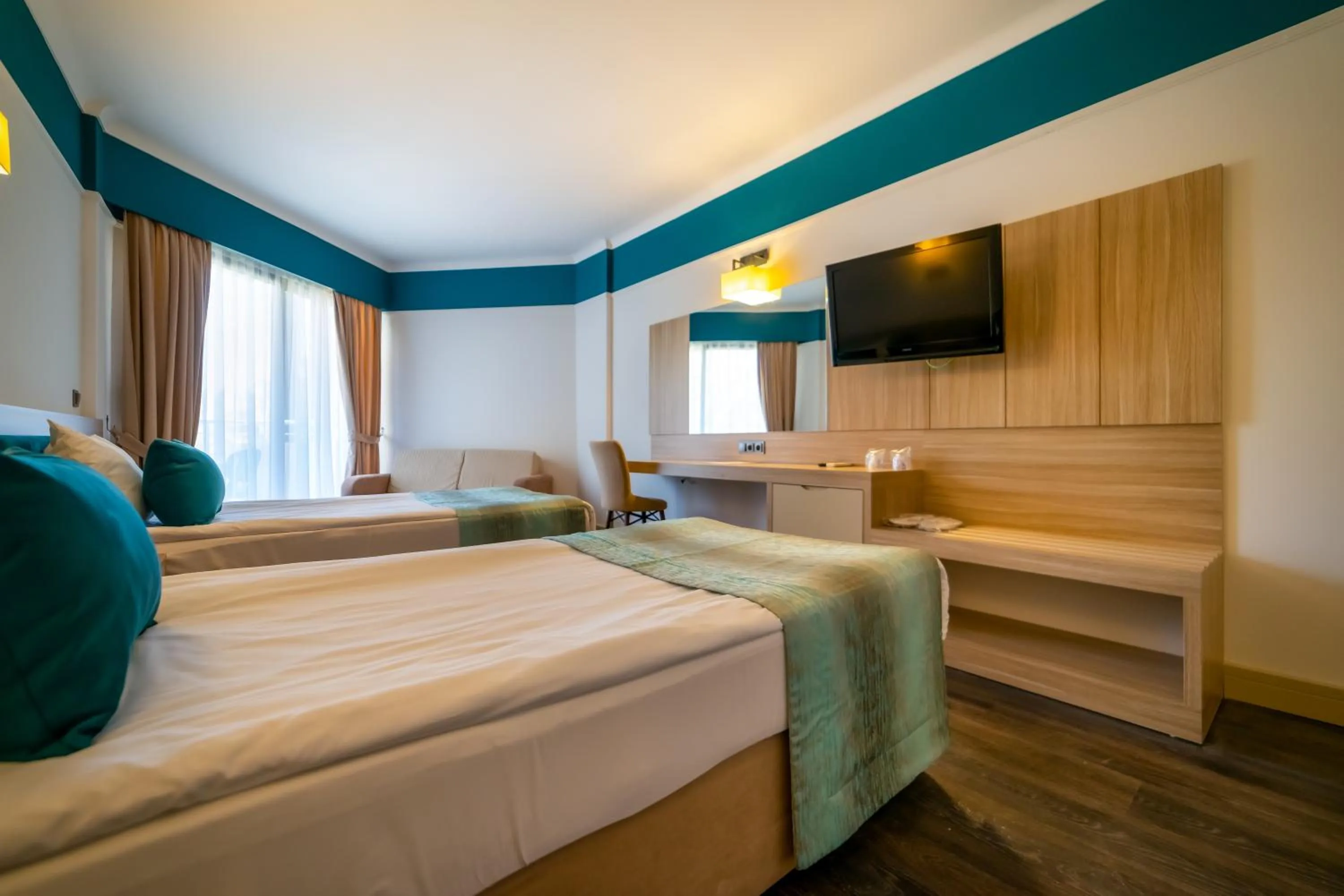 Bed in Armas Hotel Saray Regency