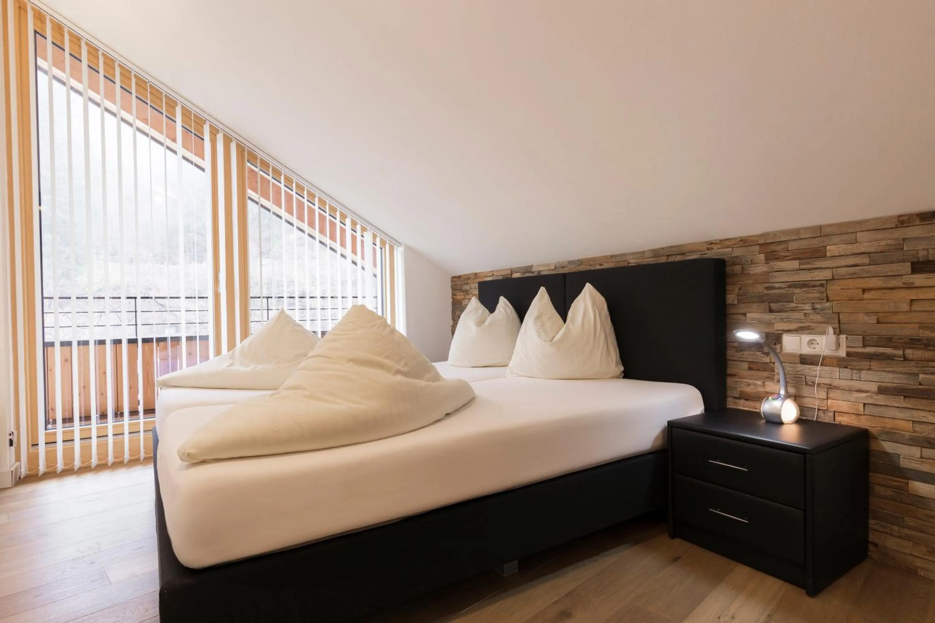 Bedroom, Bed in Aparthotel Herzblick GmbH