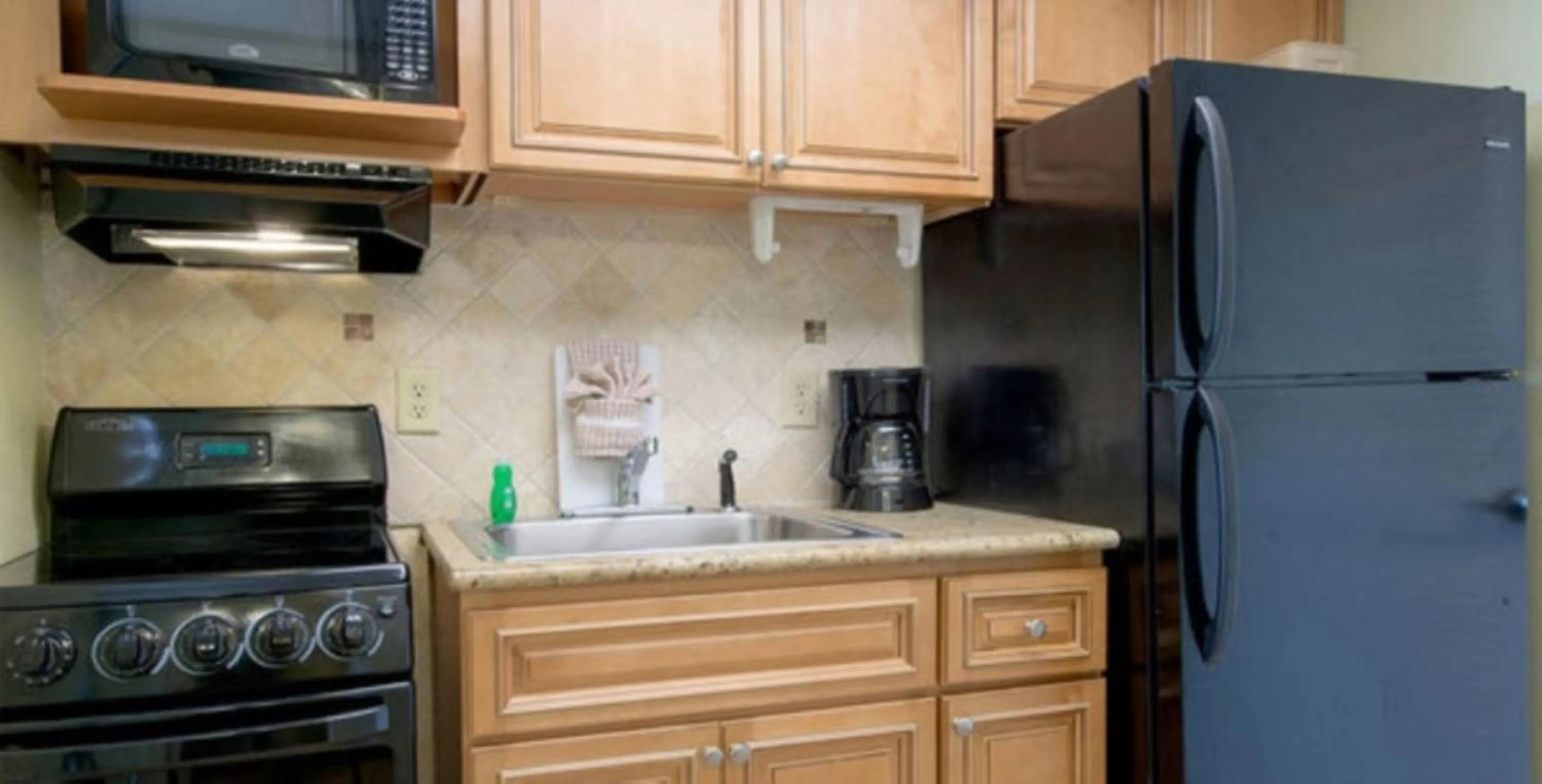 Kitchen or kitchenette in Compass Cove