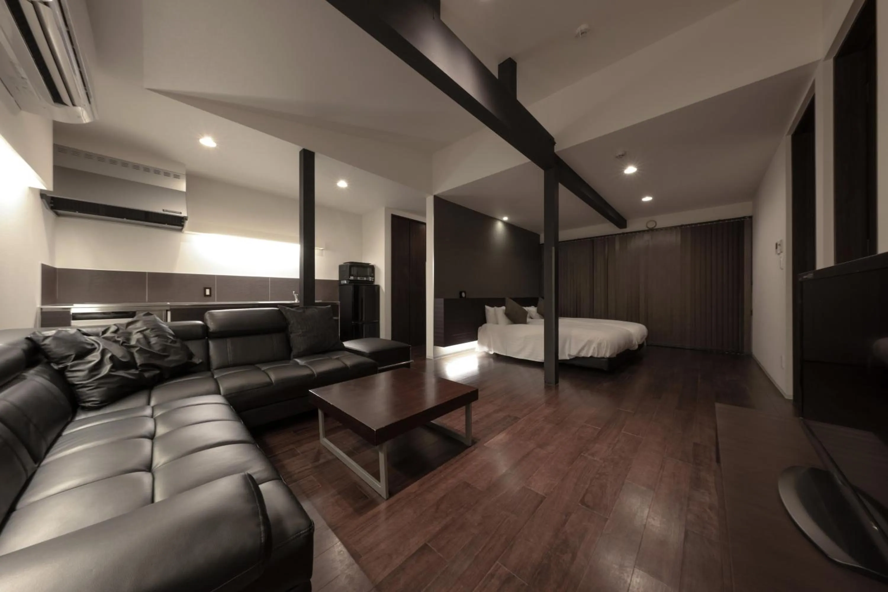 Living room, Bed in Furano Natulux Hotel