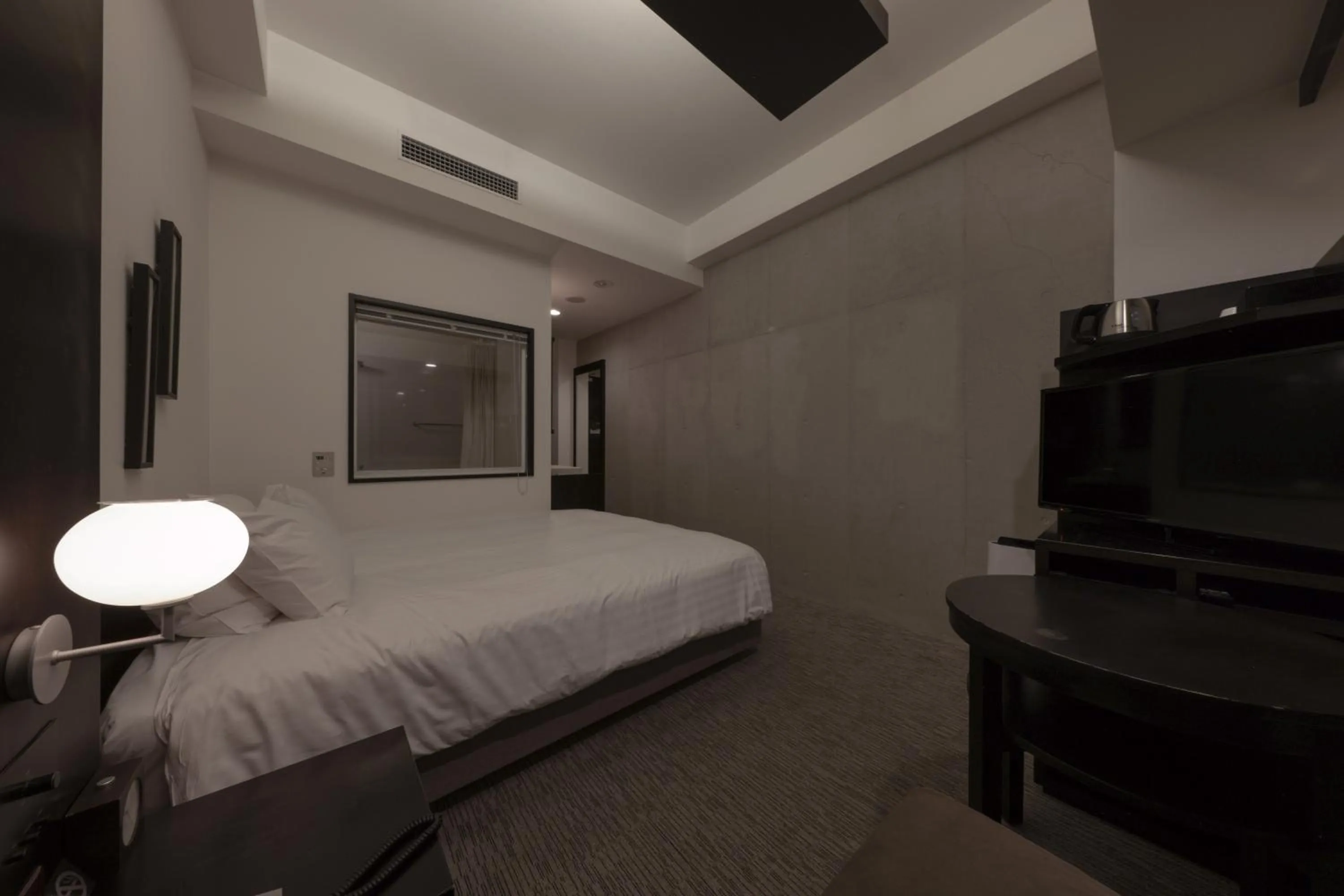 Bed in Furano Natulux Hotel