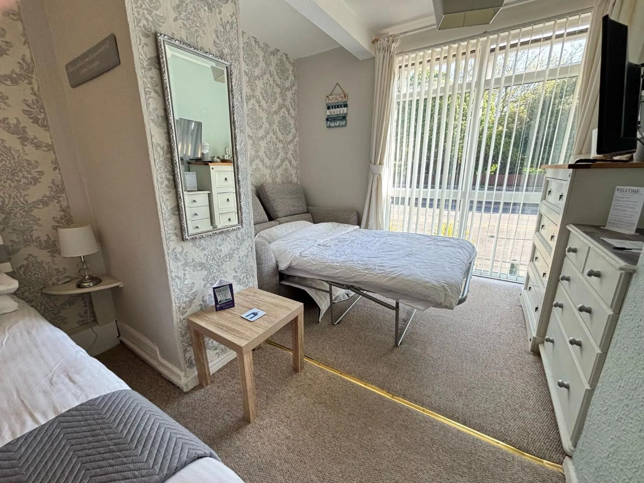 Bed in Three Palms Hotel