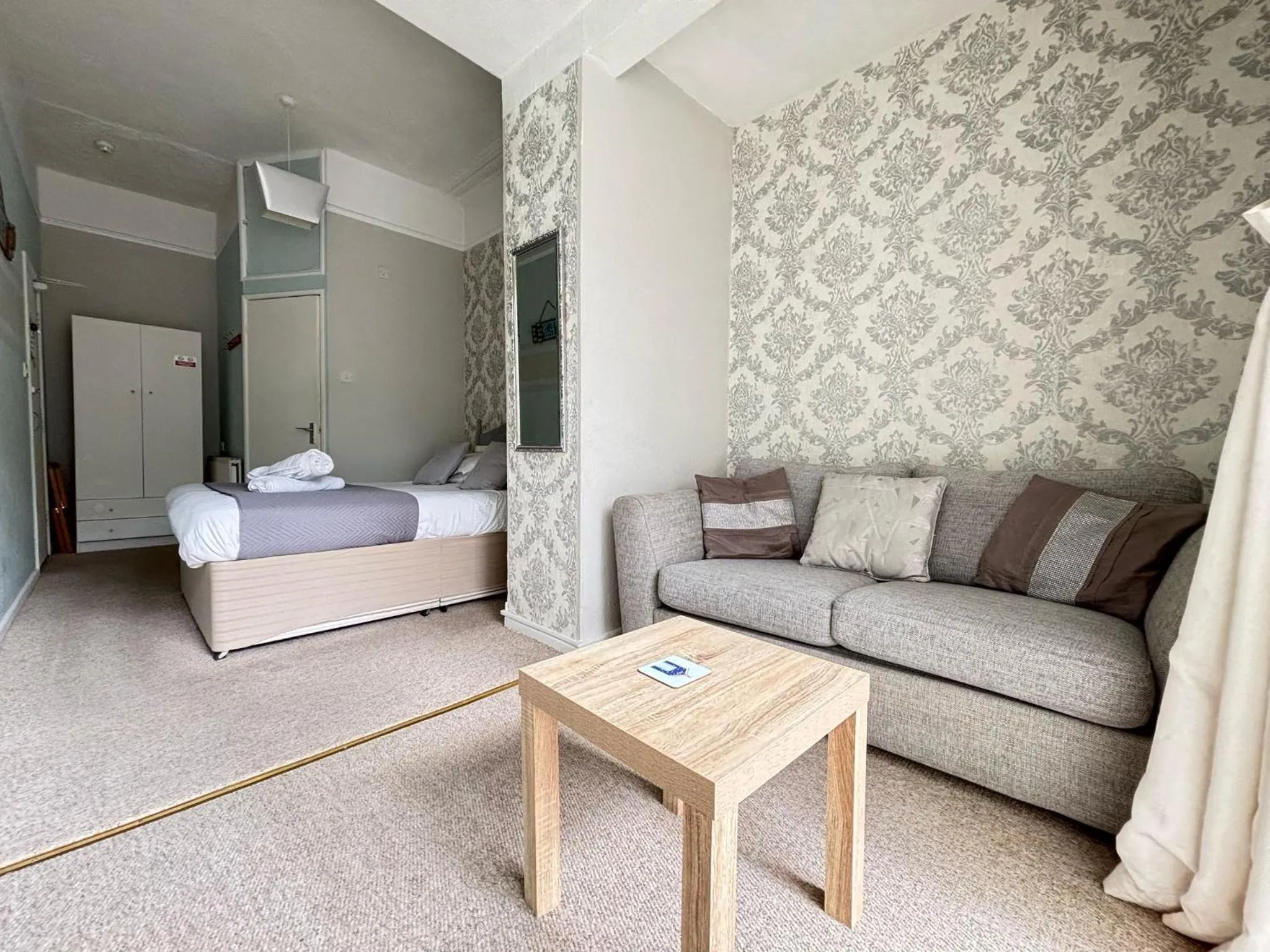 Bed in Three Palms Hotel