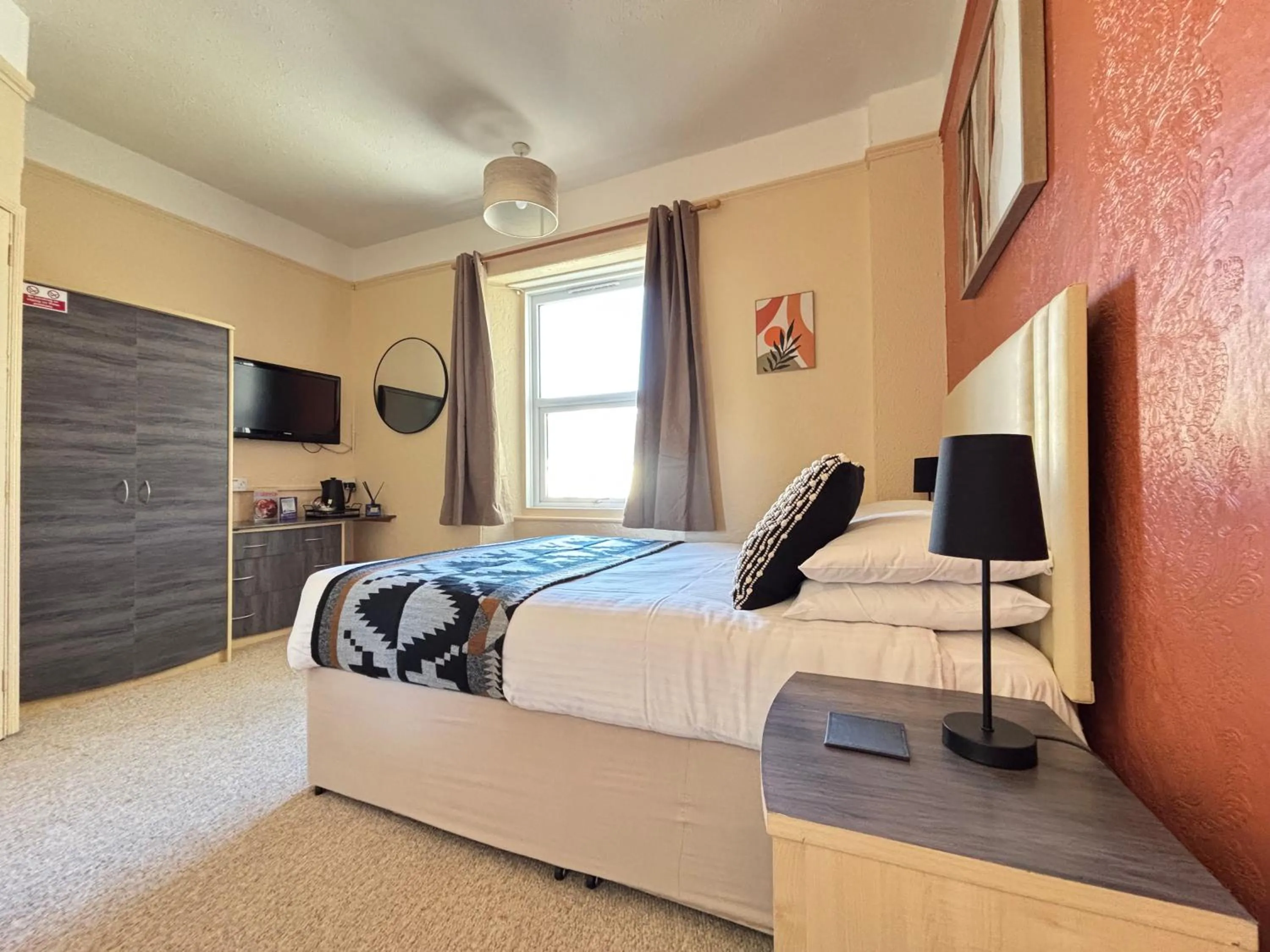 Bed in Three Palms Hotel