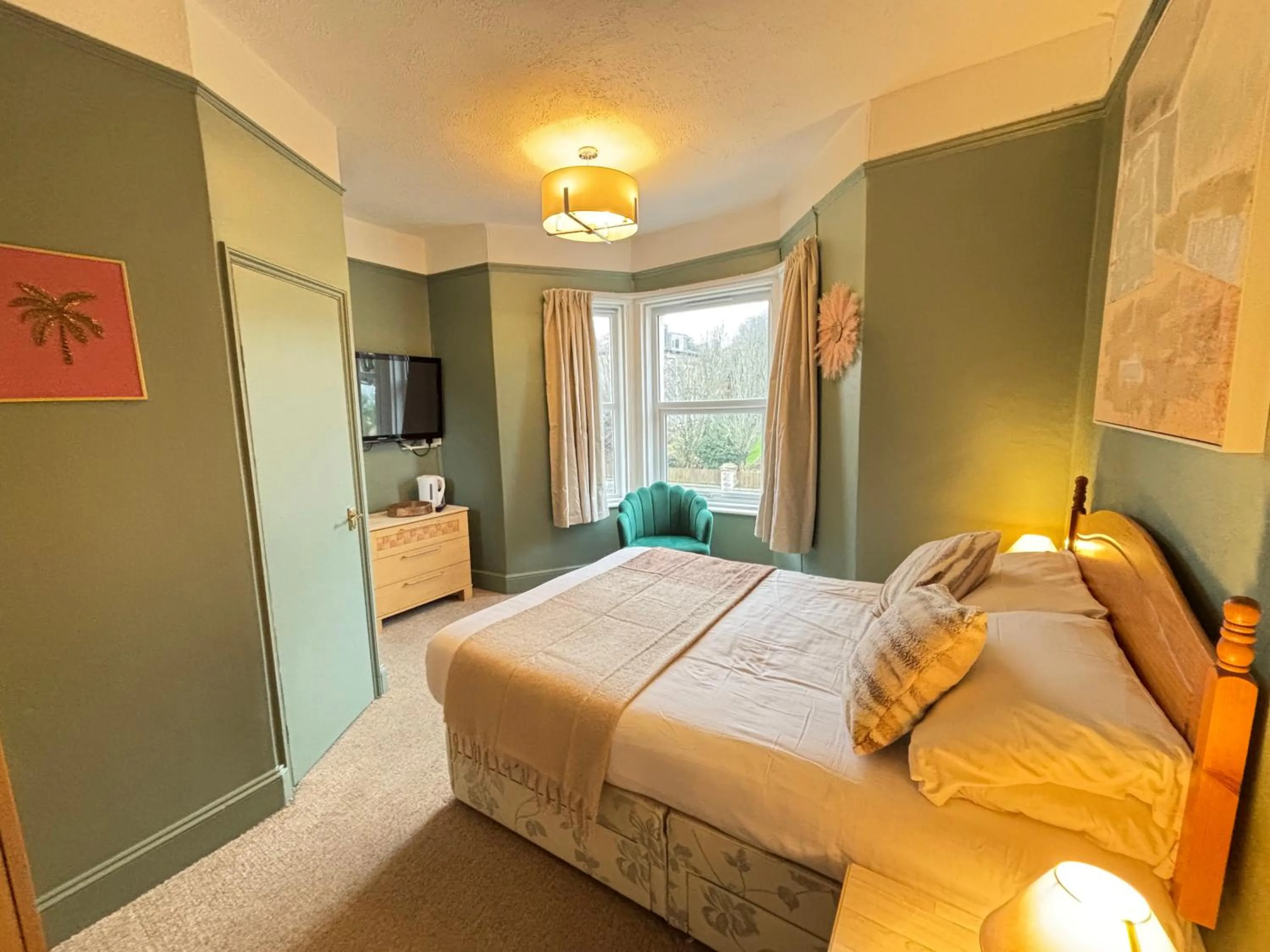 Bed in Three Palms Hotel