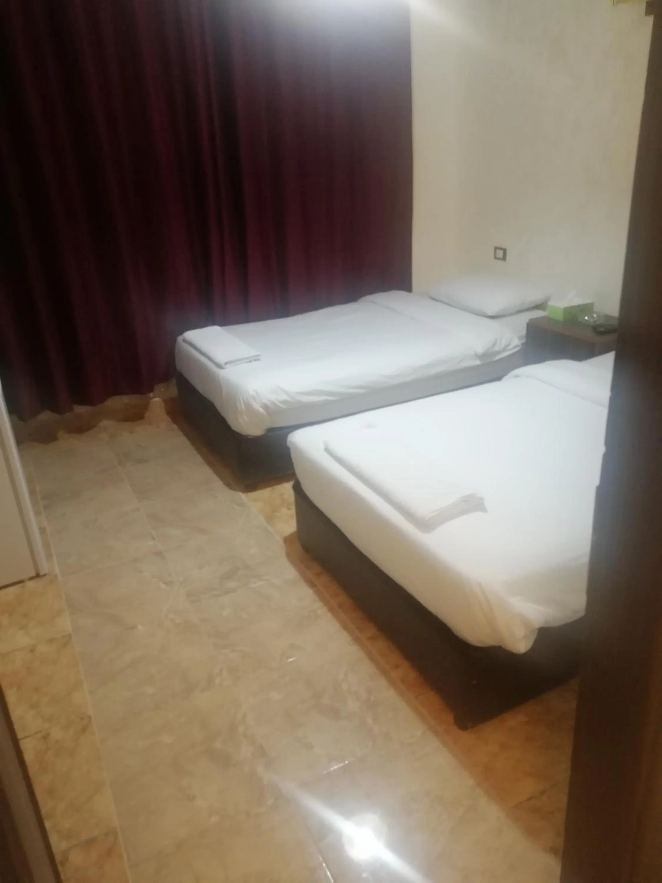 Bed in Al-Houriat Hotel