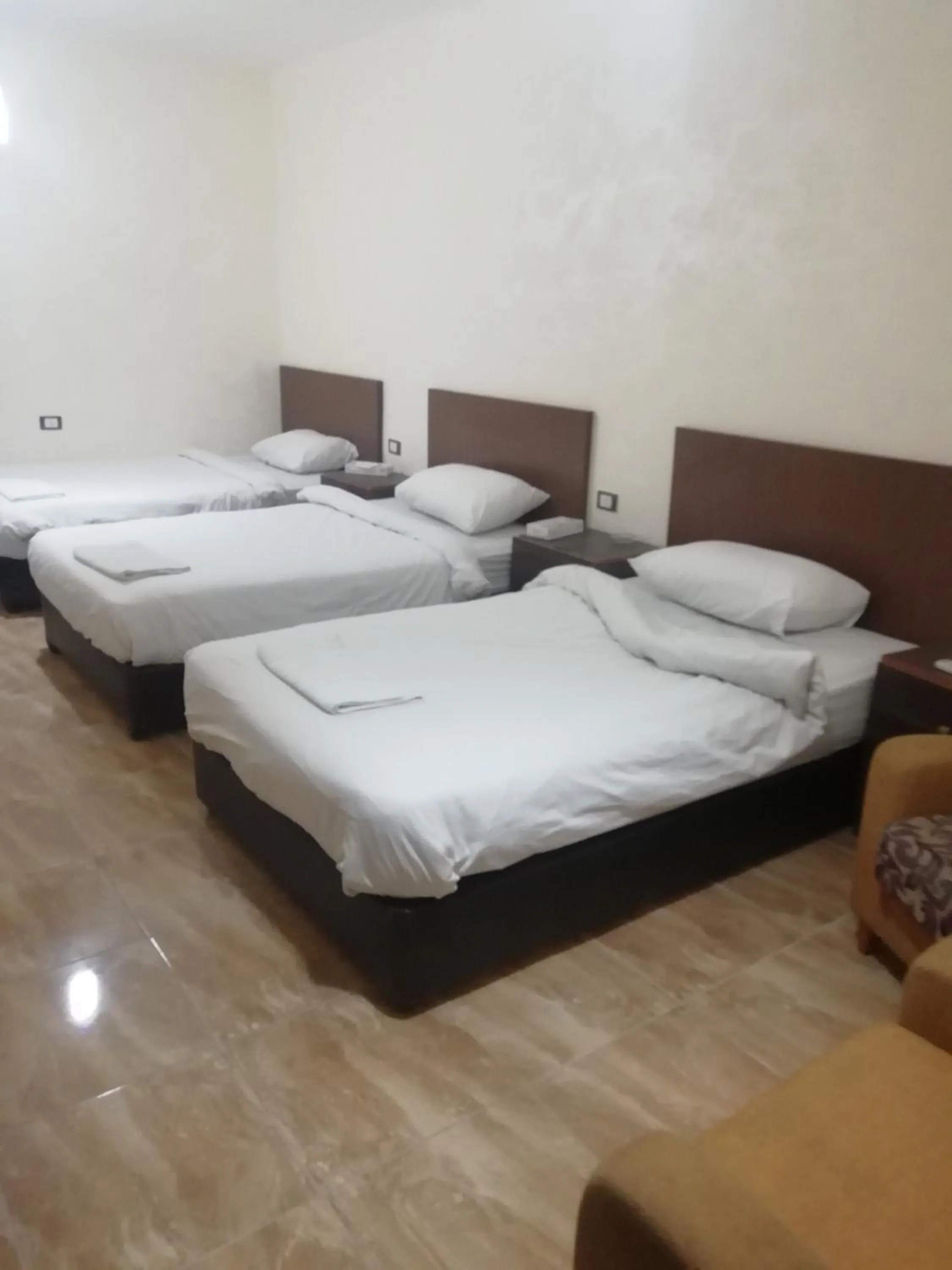 Bed in Al-Houriat Hotel