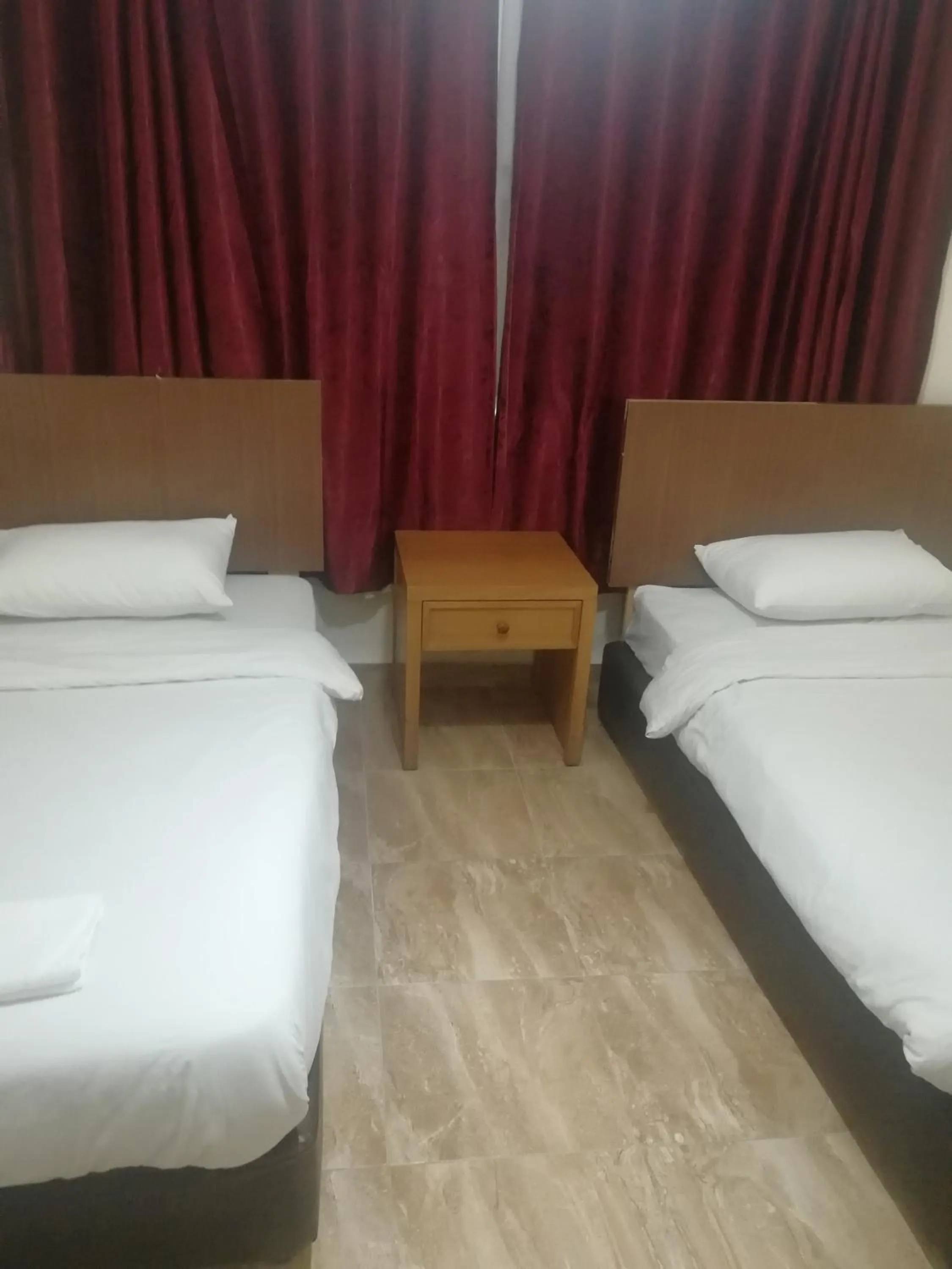 Bed in Al-Houriat Hotel