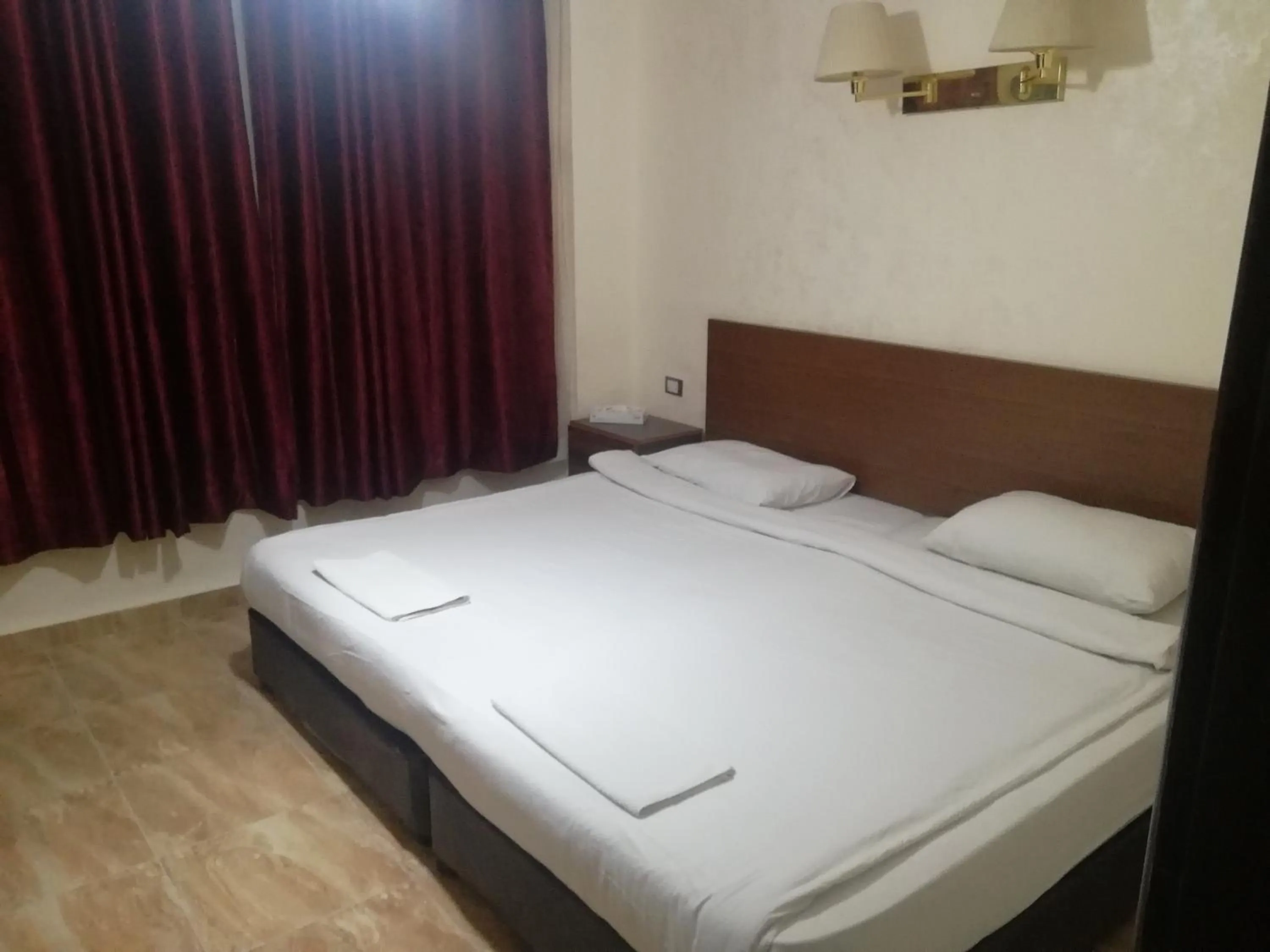 Bed in Al-Houriat Hotel