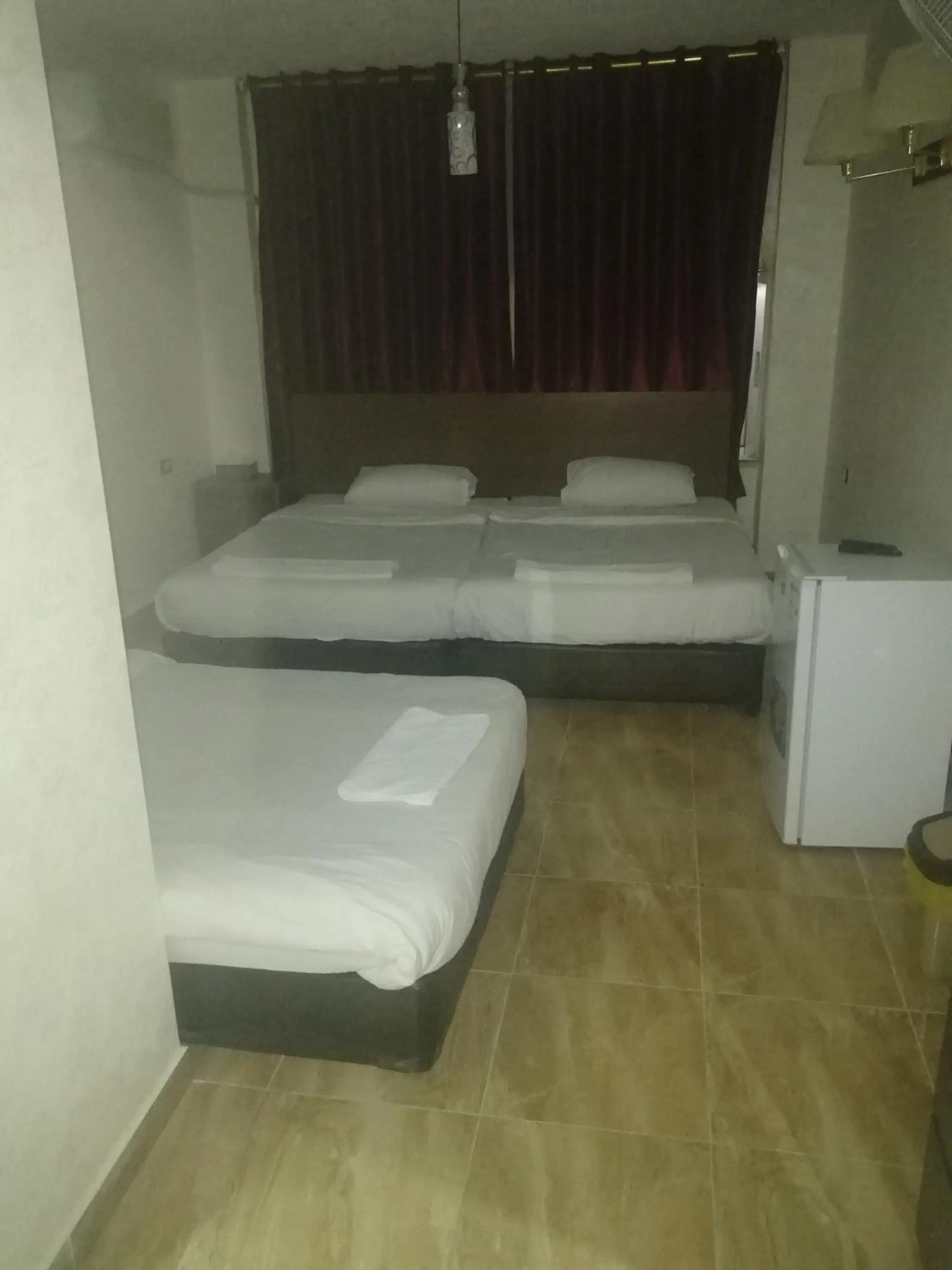 Bed in Al-Houriat Hotel