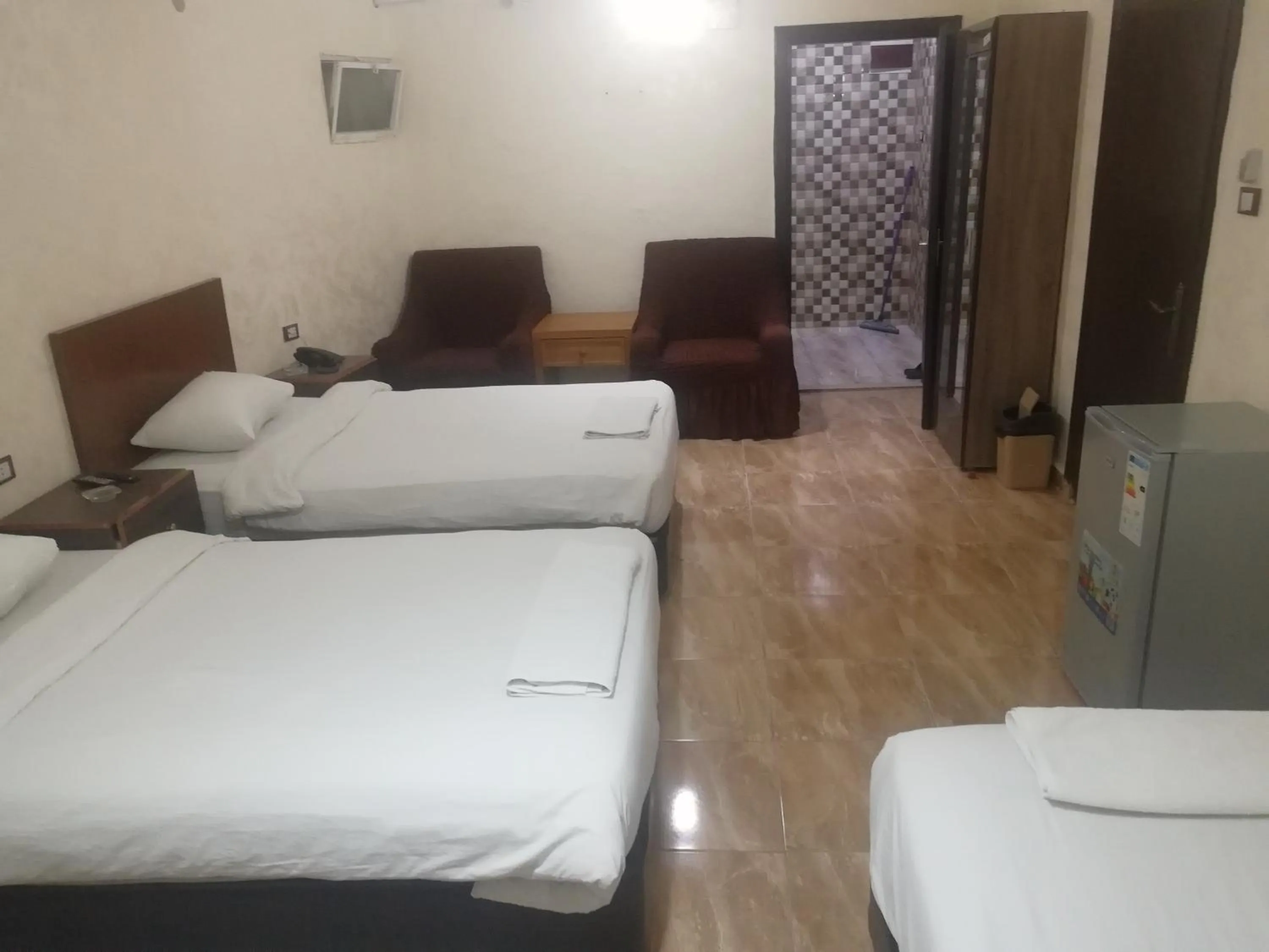 Bed in Al-Houriat Hotel